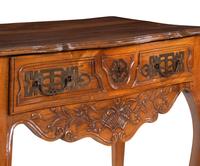 A Louis XV Provincial Carved Walnut Table