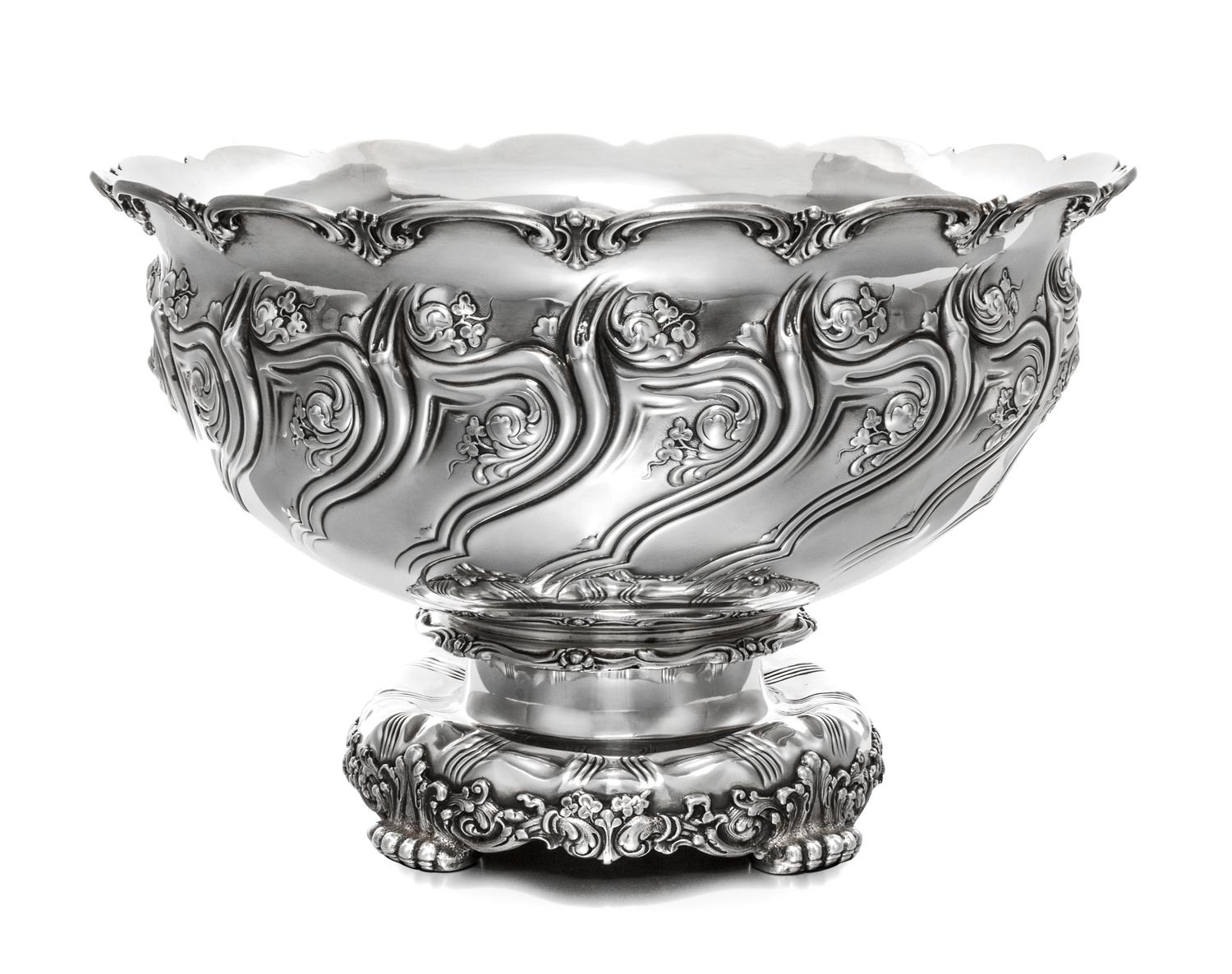 An American Silver Punch Bowl, Tiffany & Co, New York, NY, 1893, the rim worked with C-scrolls, the body with repousse decorated clover