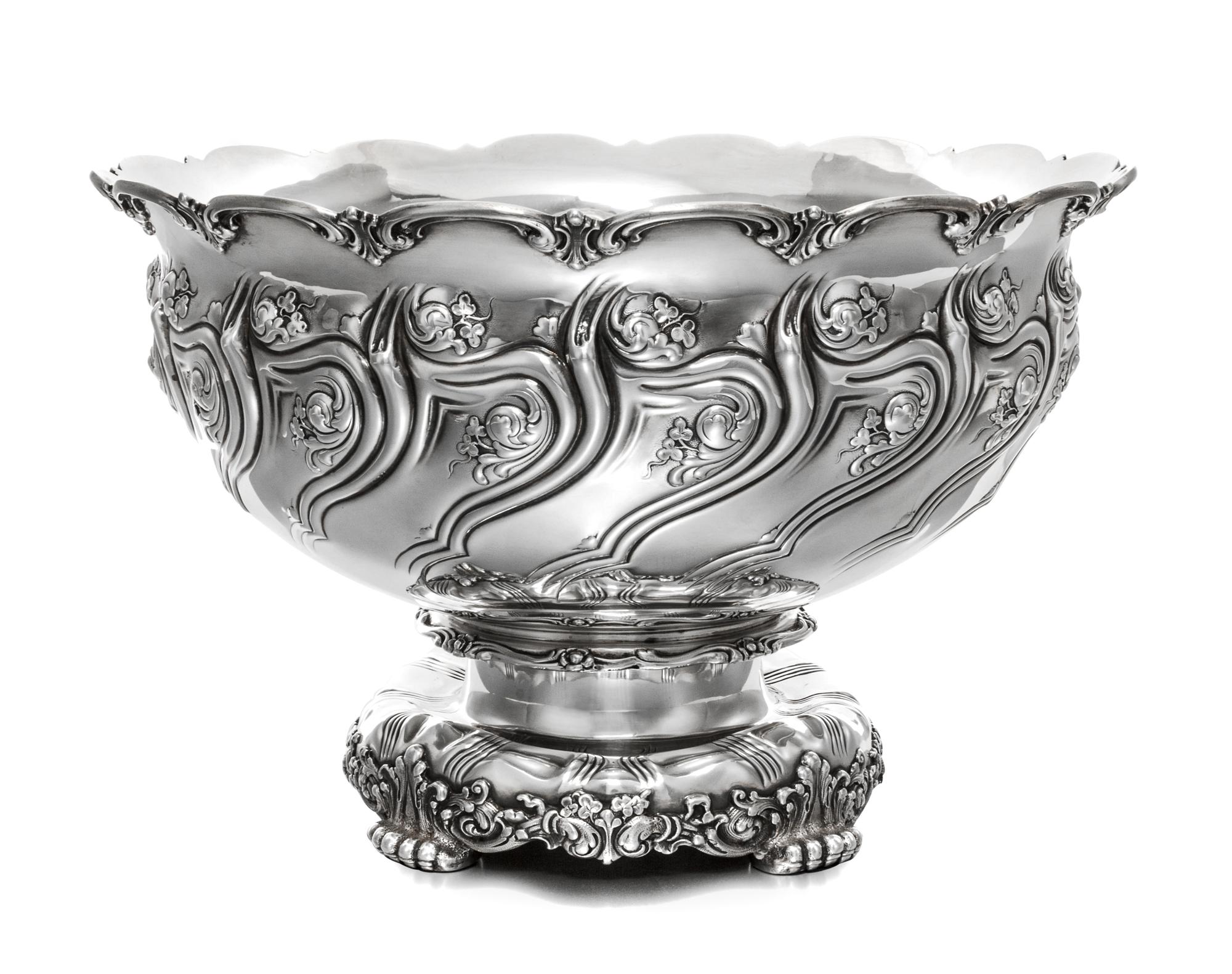 An American Silver Punch Bowl, Tiffany & Co, New York, NY, 1893, the rim worked with C-scrolls, the body with repousse decorated clover