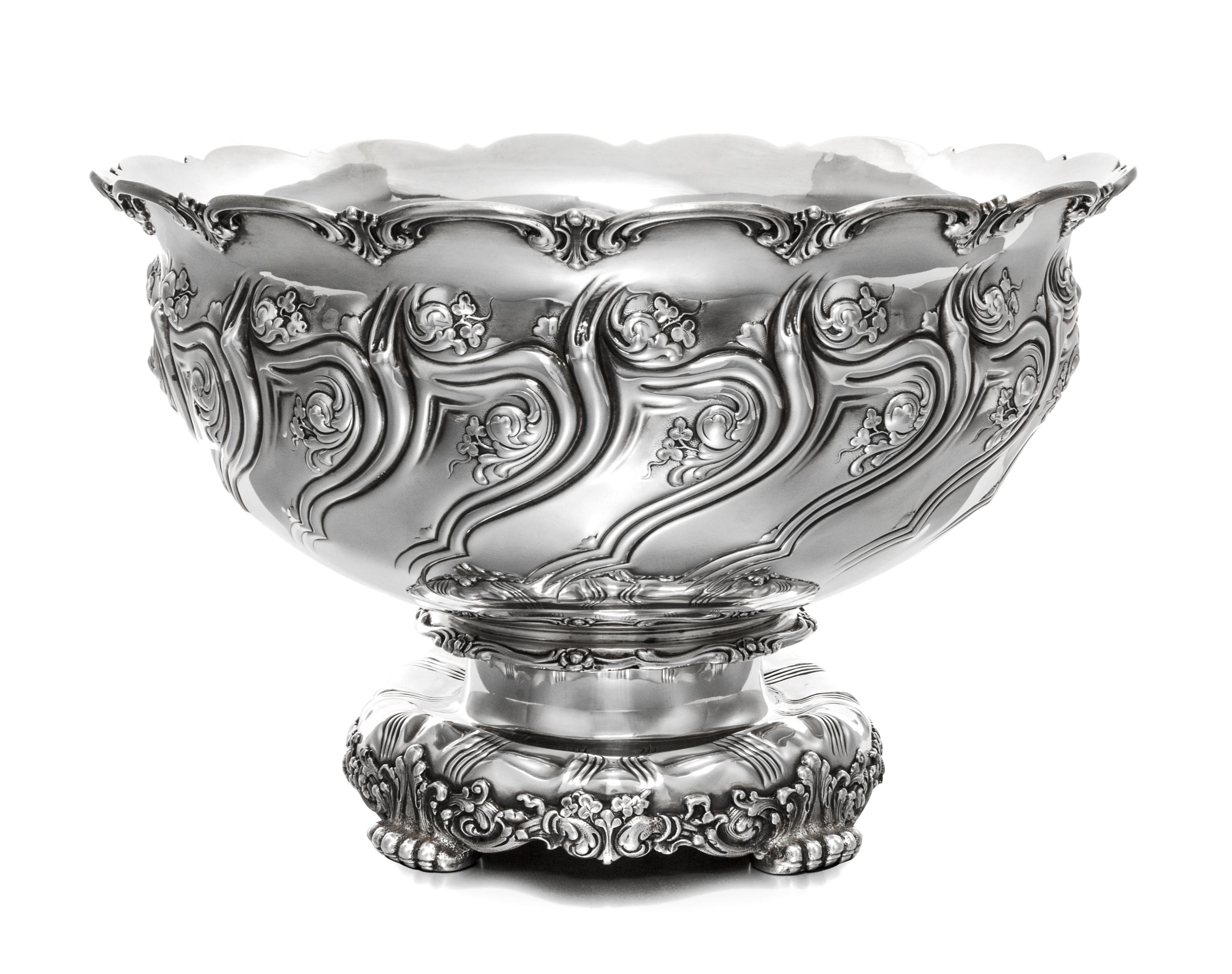 An American Silver Punch Bowl, Tiffany & Co, New York, NY, 1893, the rim worked with C-scrolls, the body with repousse decorated clover