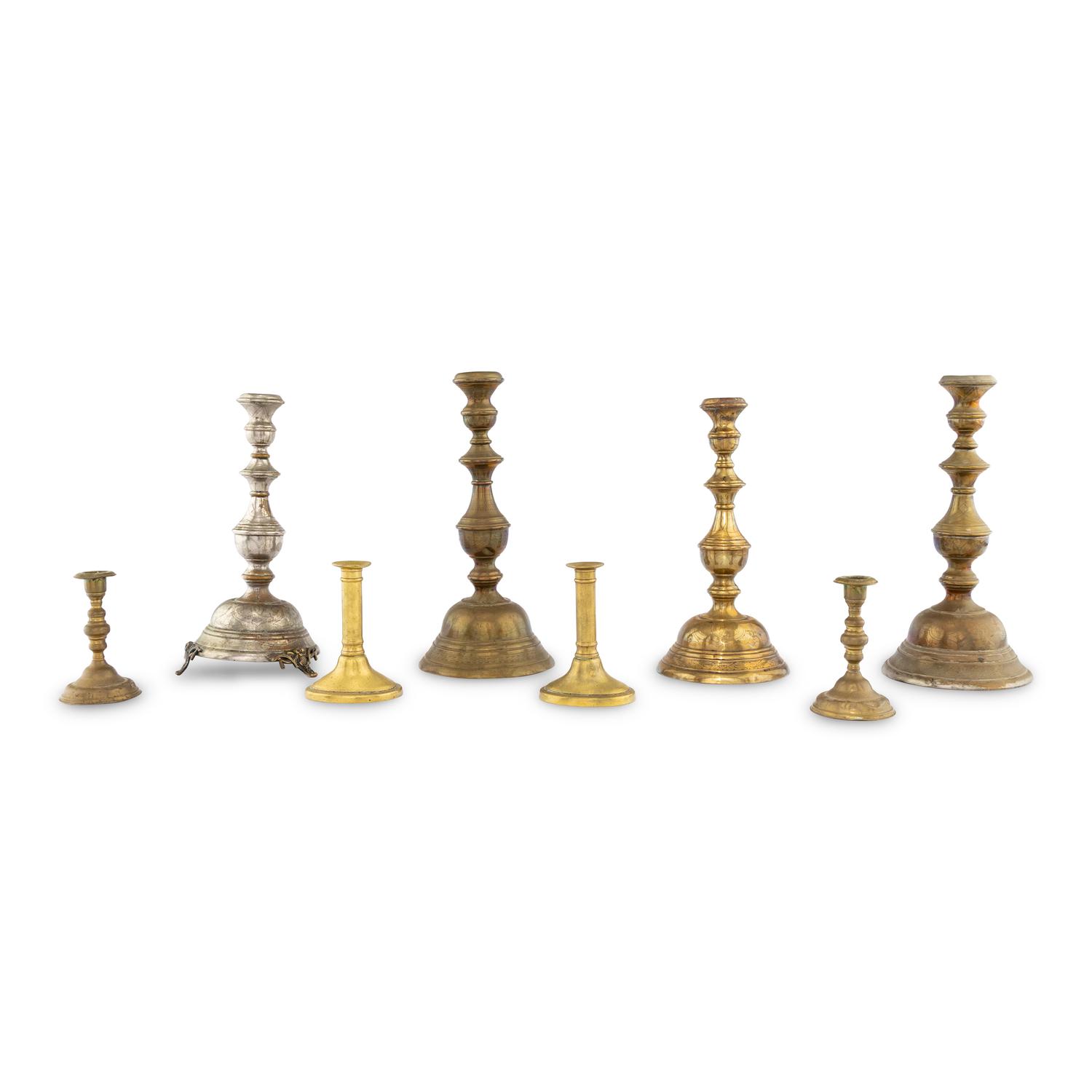 A Collection of Eight Candlesticks