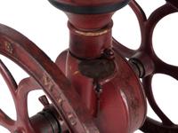 An Elgin National Painted Cast Iron Coffee Mill with Eagle Finial