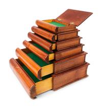 A Stack of Pine Book-Form Boxes — 20TH CENTURY