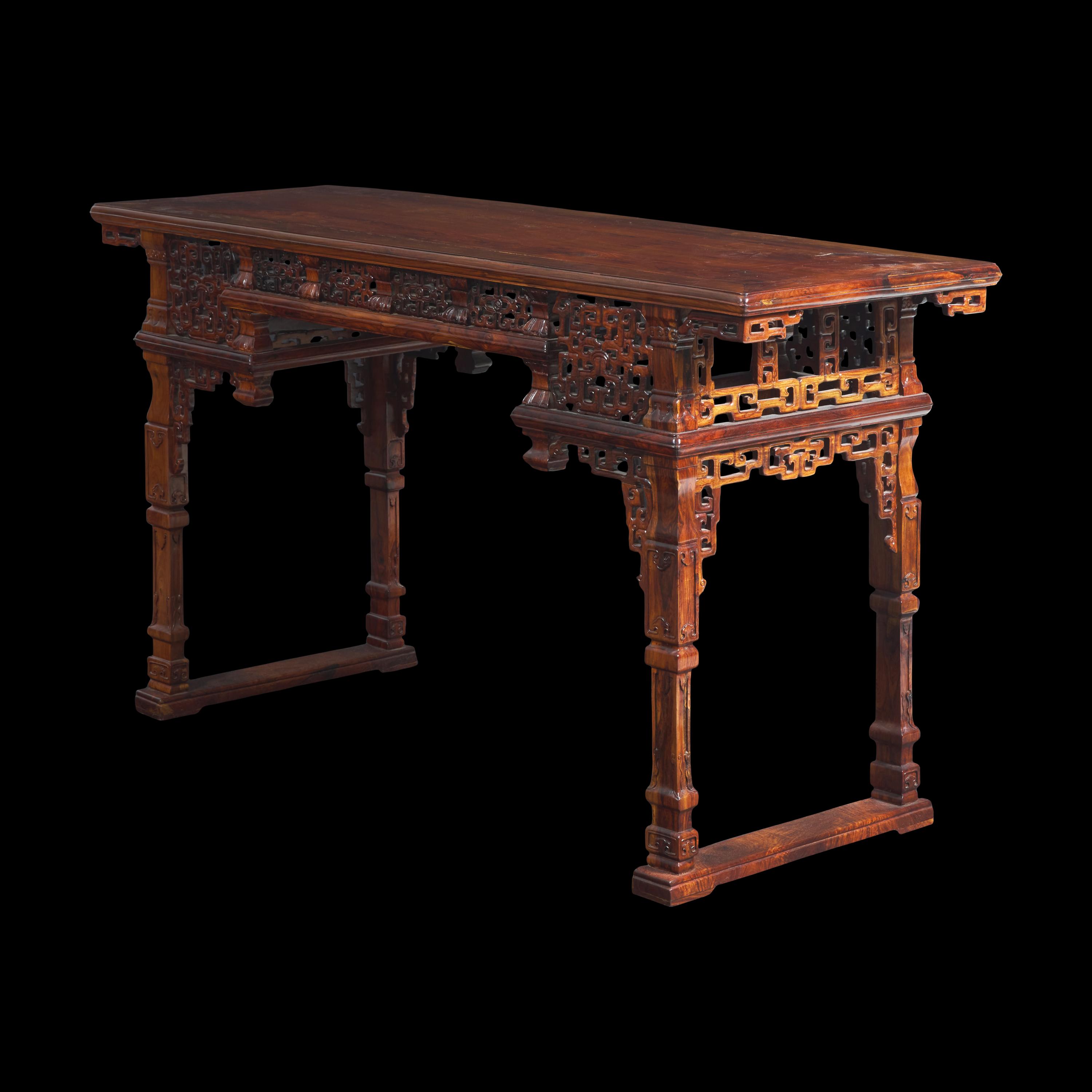 A Chinese Carved Huanghuali Side Table, Tiaozhuo, Late 19th to 20th Century 晚清民國 黃花梨透雕夔龍紋條桌