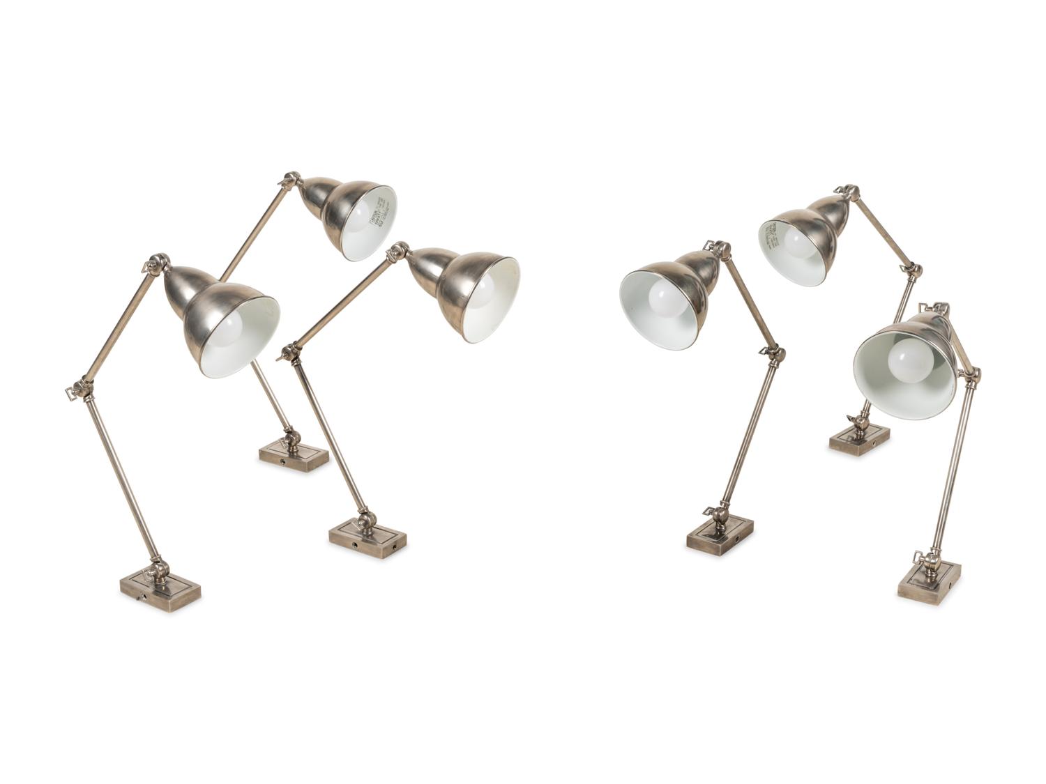 A Set of Six Swing-Arm Wall Lights