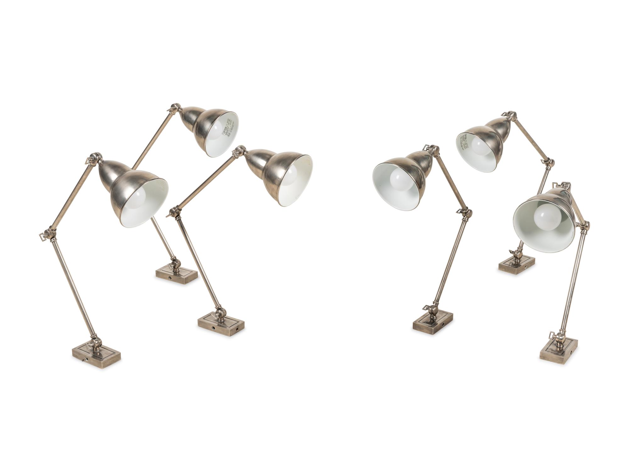 A Set of Six Swing-Arm Wall Lights