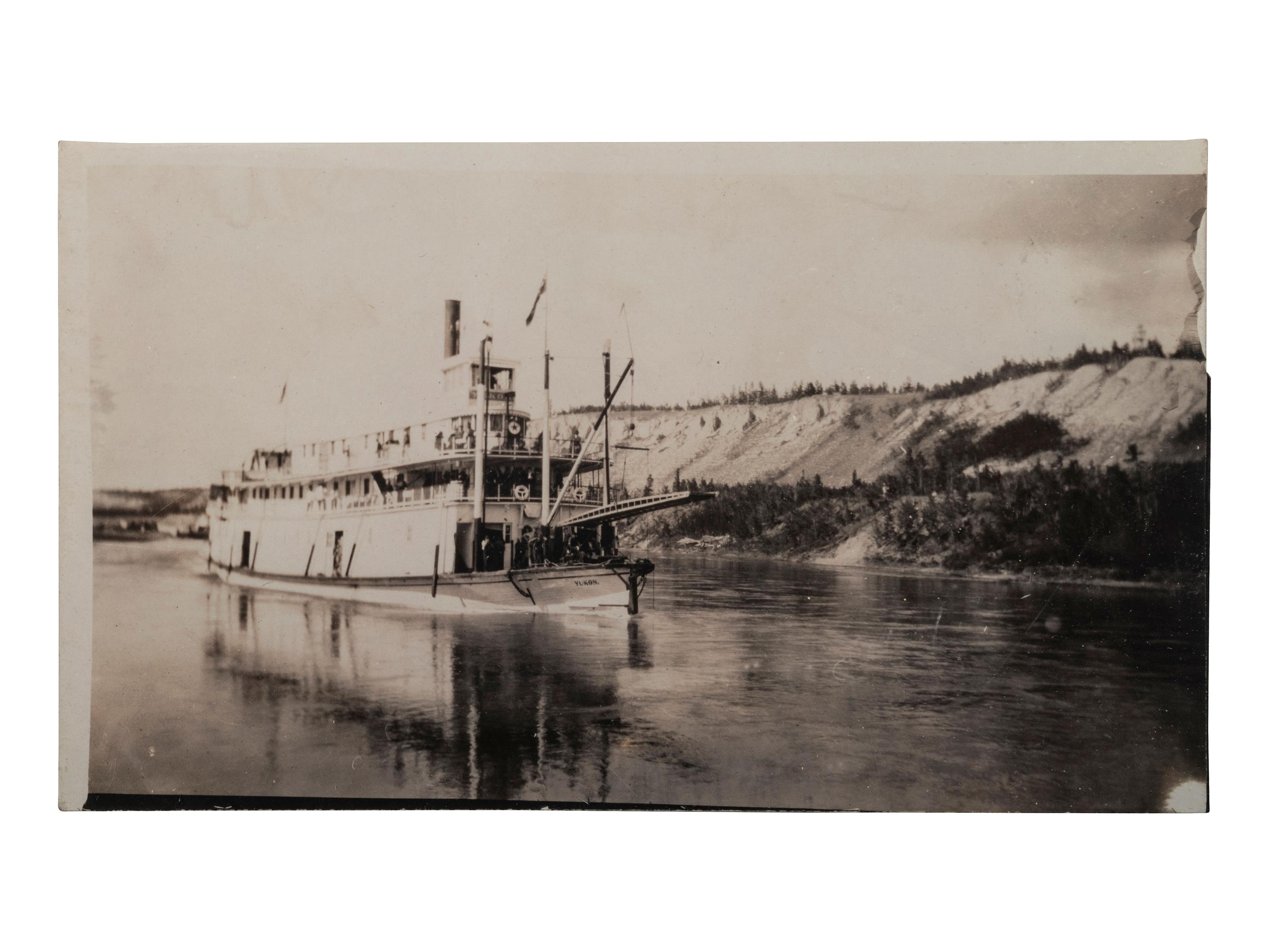 [BOATS]. A group of 54 RPPCs & photos of steamboats, sailing ships, and other vessels.