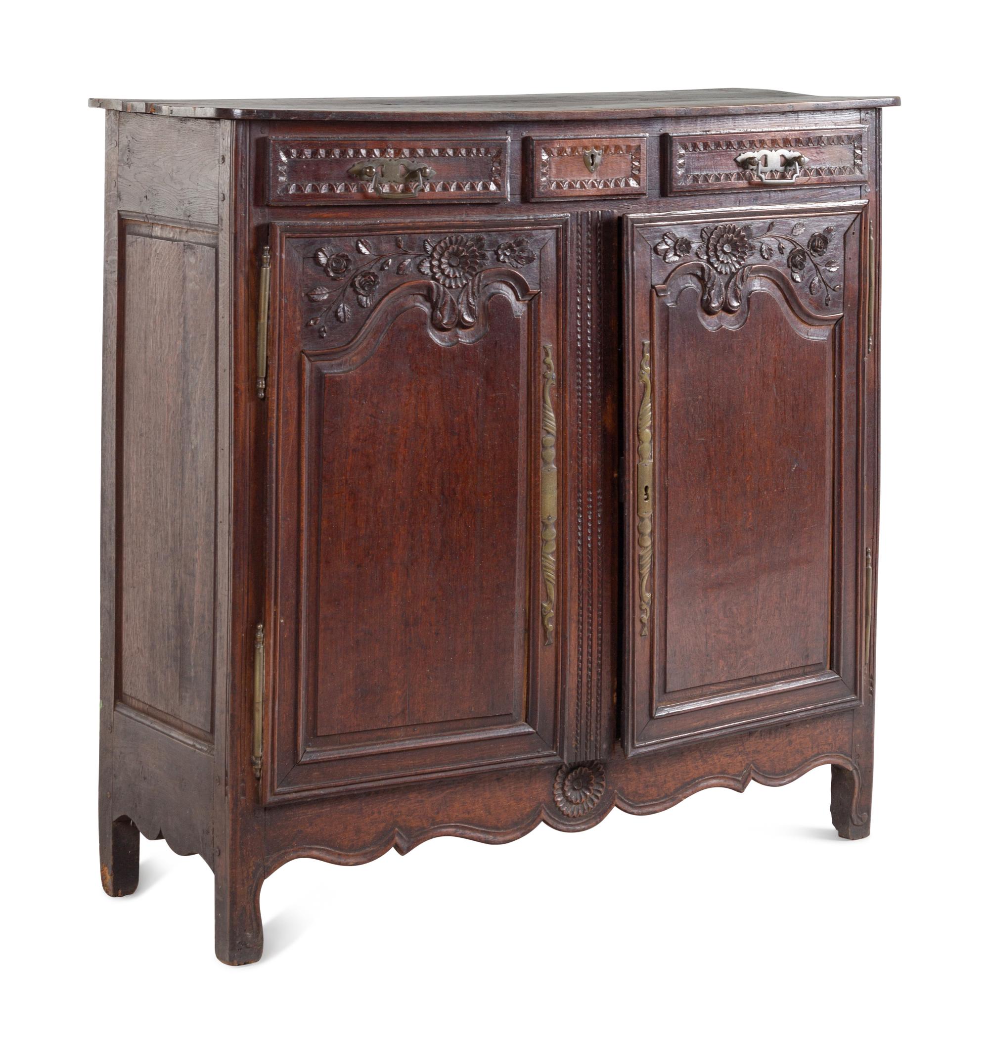 A French Provincial Oak Cabinet