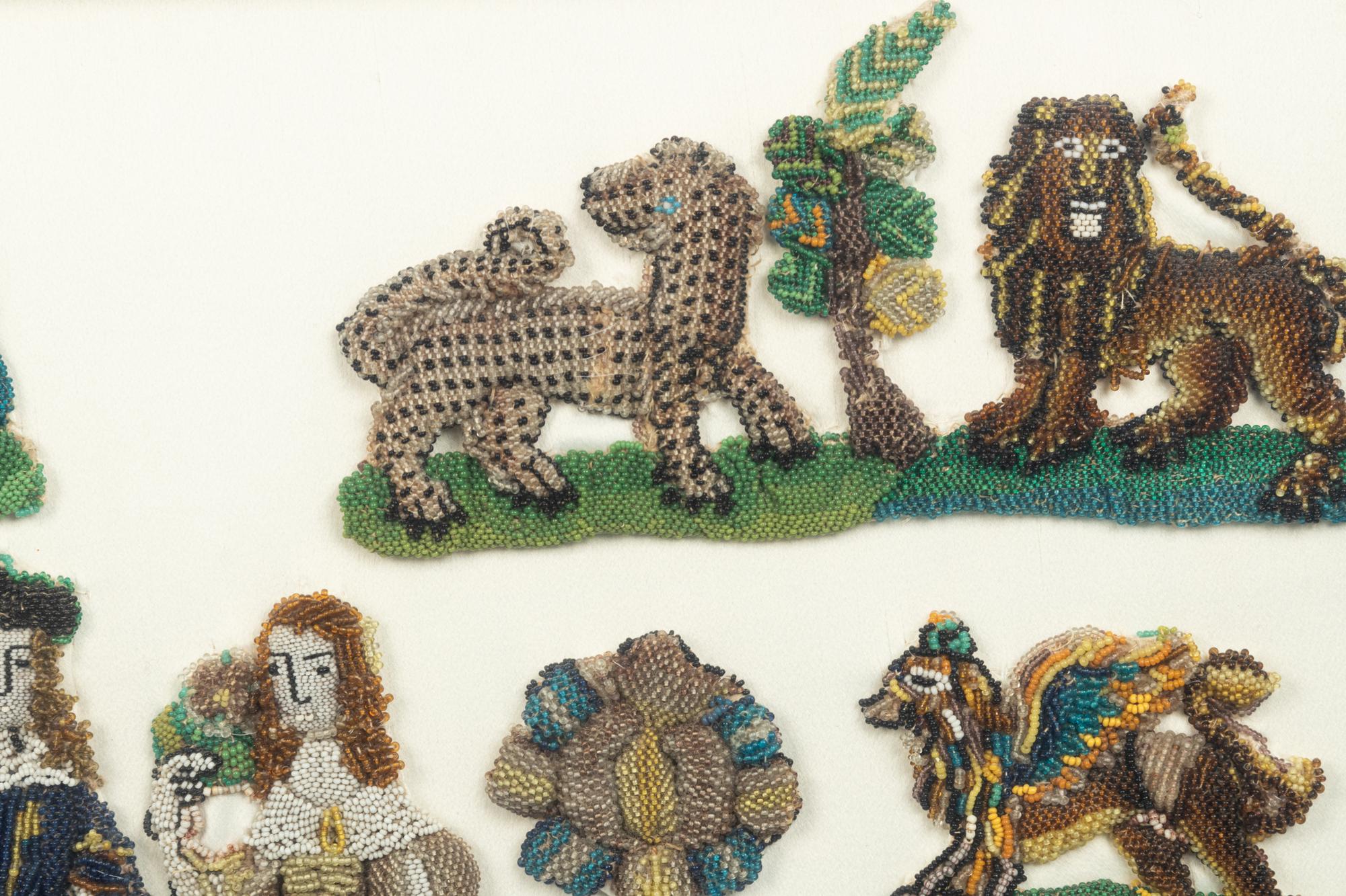 A Group of English Beadworks in a Flemish Tortoise Shell and Ebonized Ripple-Molded Frame