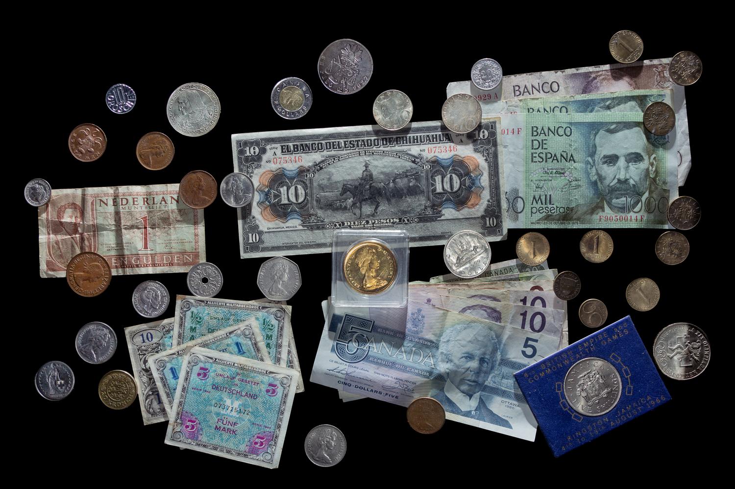 A Collection of International Coins and Paper Money