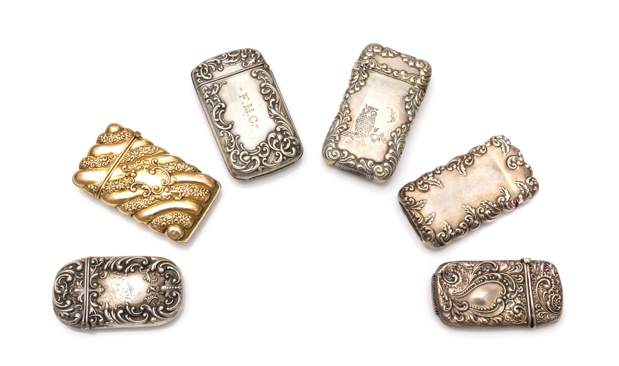 A Collection of Five American Silver Vesta Cases, Various Makers, comprising a William & Hoag Co., Newark, NJ example with a C-scroll a