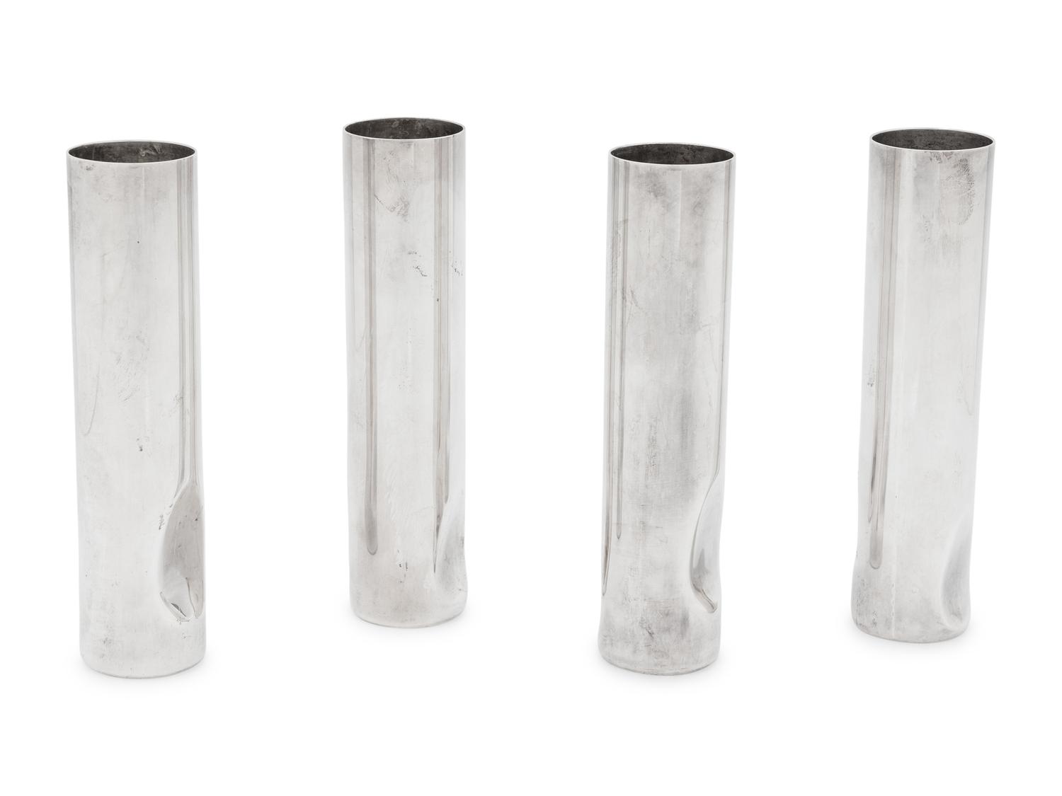 A Set of Four Elsa Peretti for Tiffany and Co. Italian Silver Thumbprint Bud Vases
