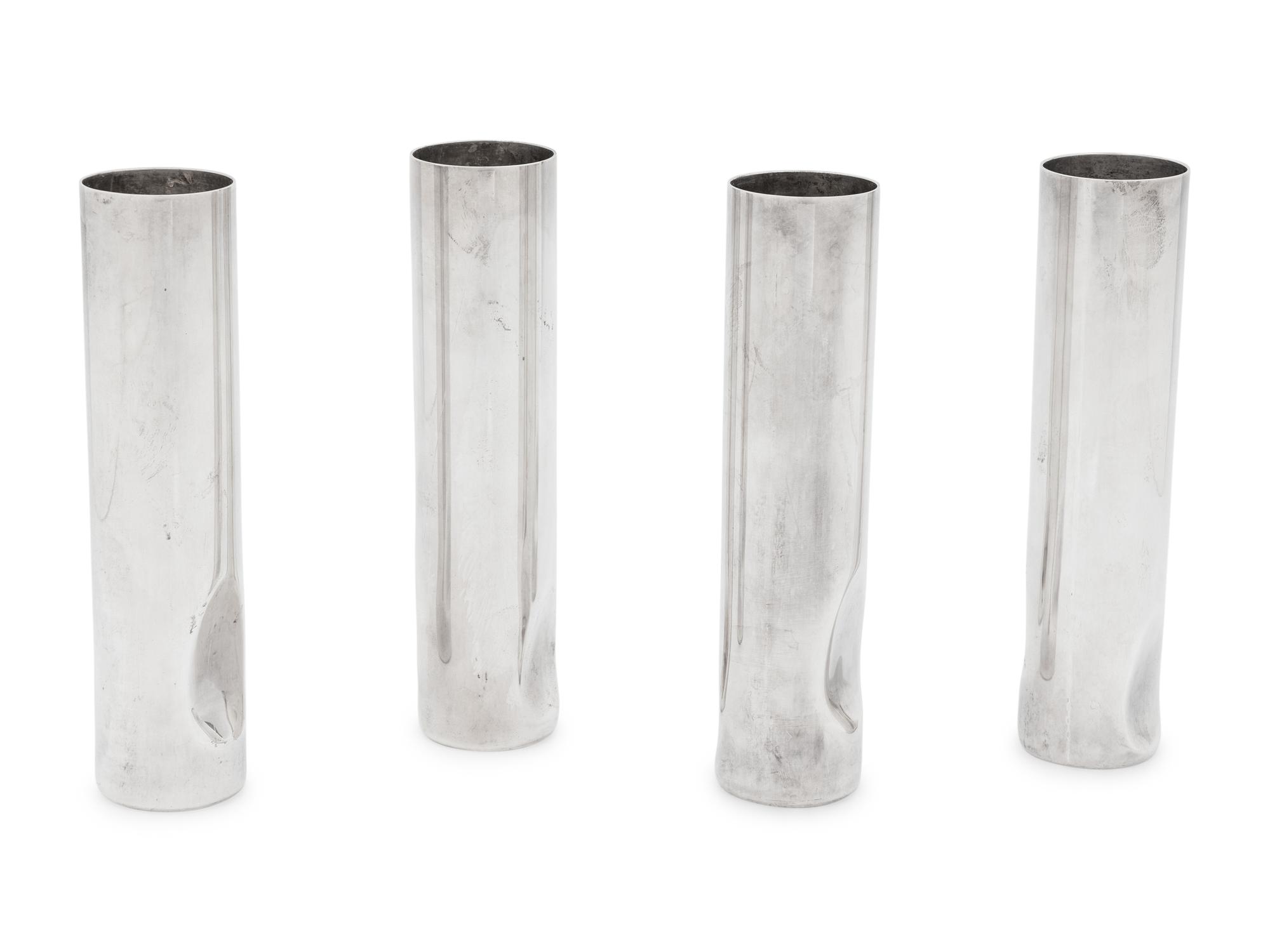 A Set of Four Elsa Peretti for Tiffany and Co. Italian Silver Thumbprint Bud Vases