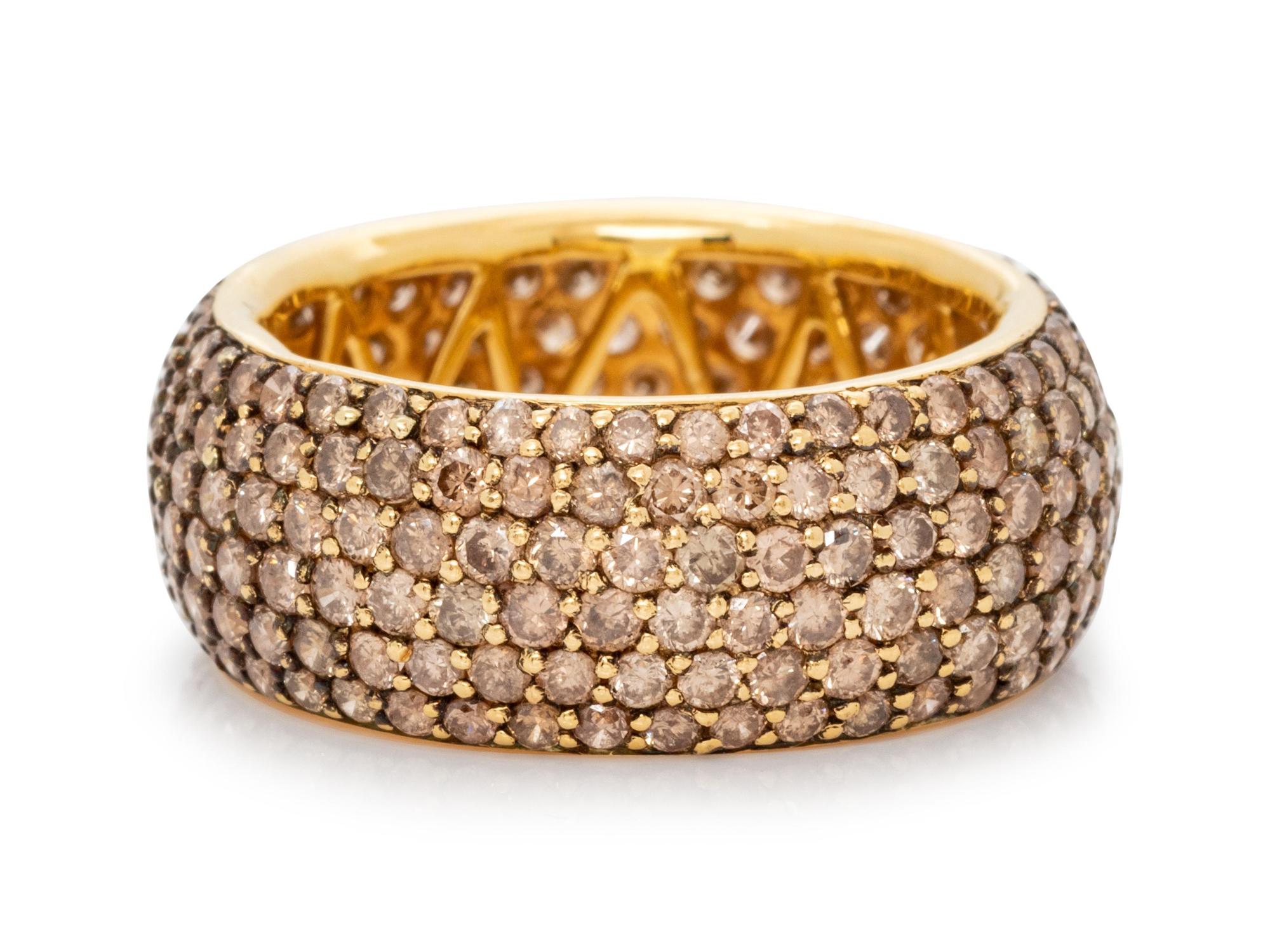 An 18 Karat Yellow Gold and Colored Diamond Eternity Band,