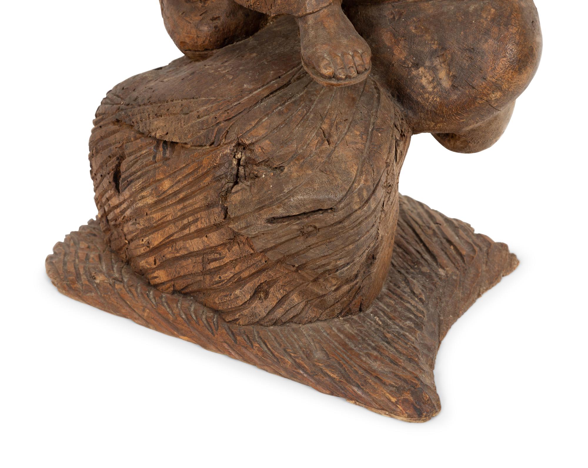 A Continental Carved Pine Figure of Female Saint