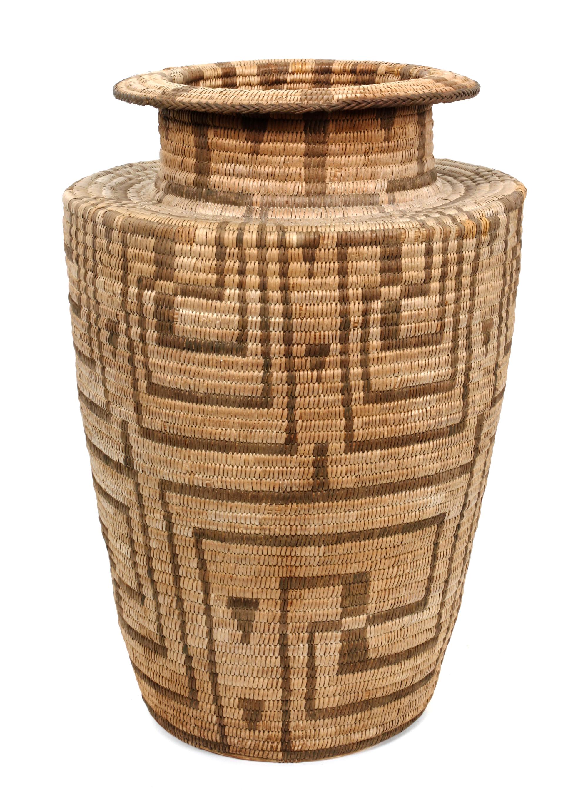 A Pima Basket Olla Height 16 1/2 x diameter 10 1/2 inches.