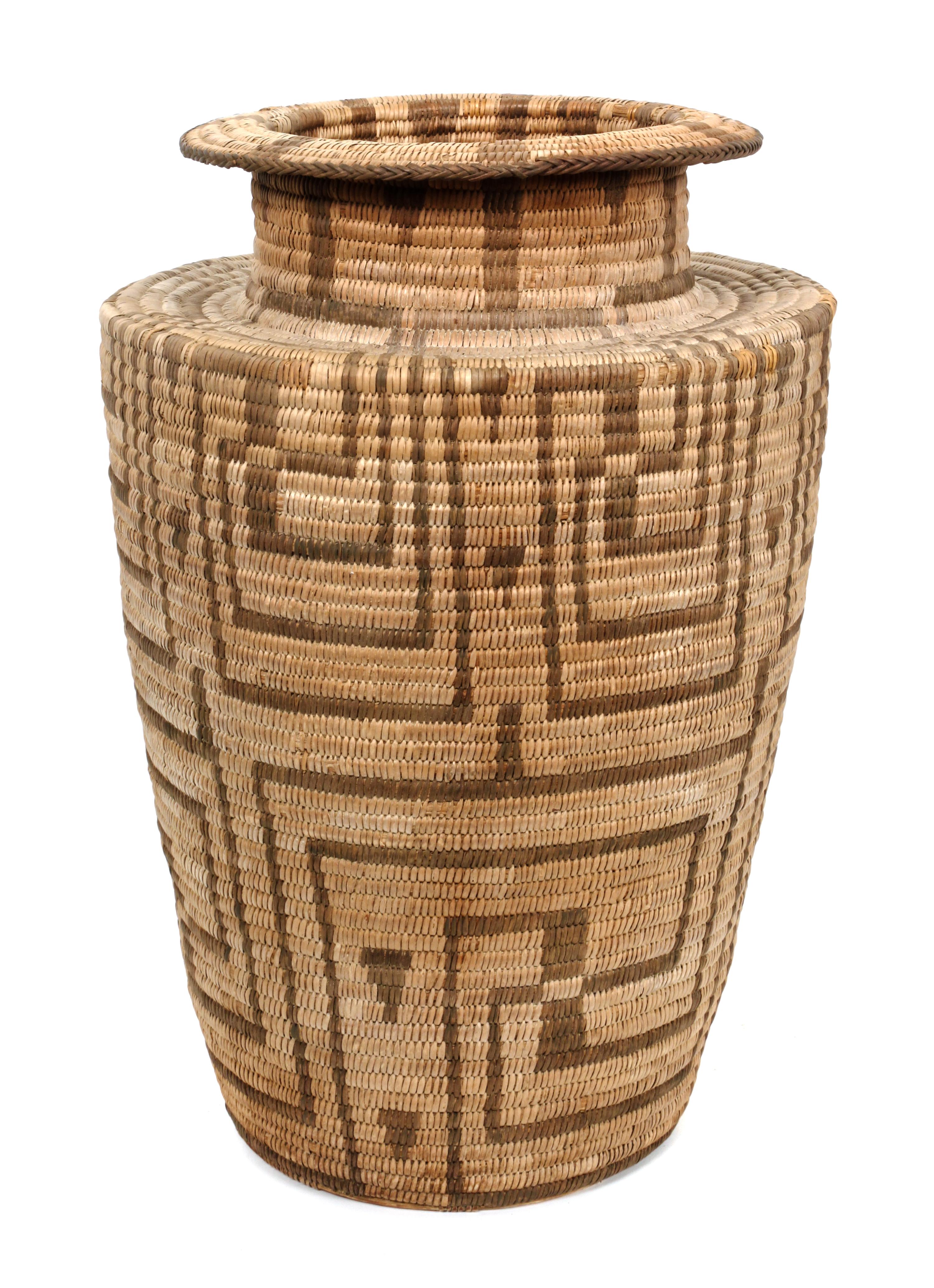 A Pima Basket Olla Height 16 1/2 x diameter 10 1/2 inches.