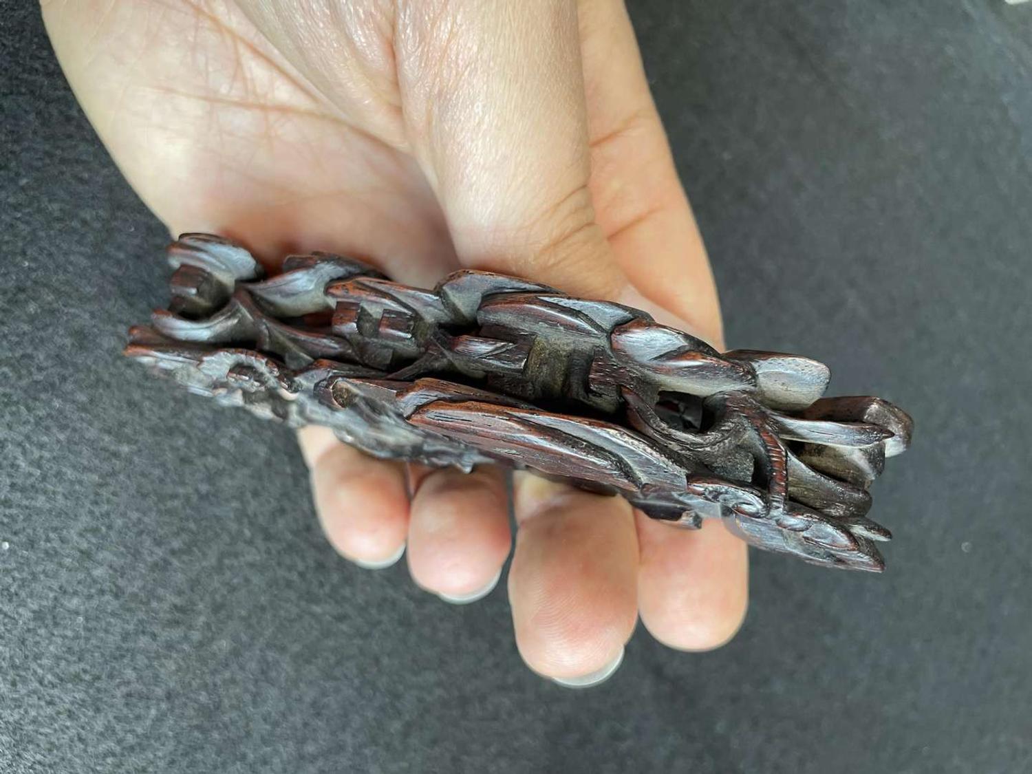 A Chinese jade "Boys, Kylin and Phoenix" vase on carved wood stand 玉雕童子凤鸟花樽及底座