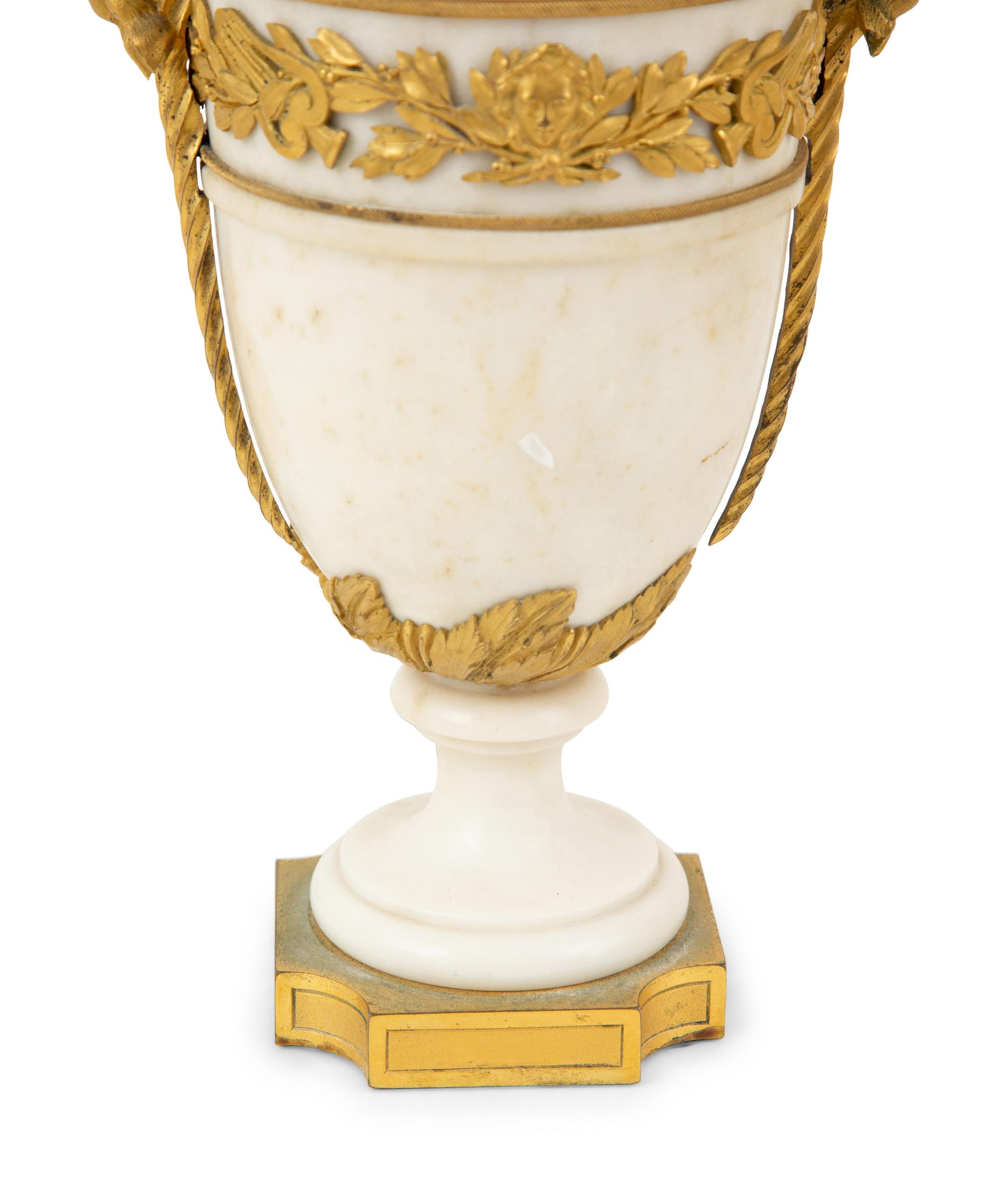 A Pair of French Gilt Metal Mouted Alabaster Table Lamps