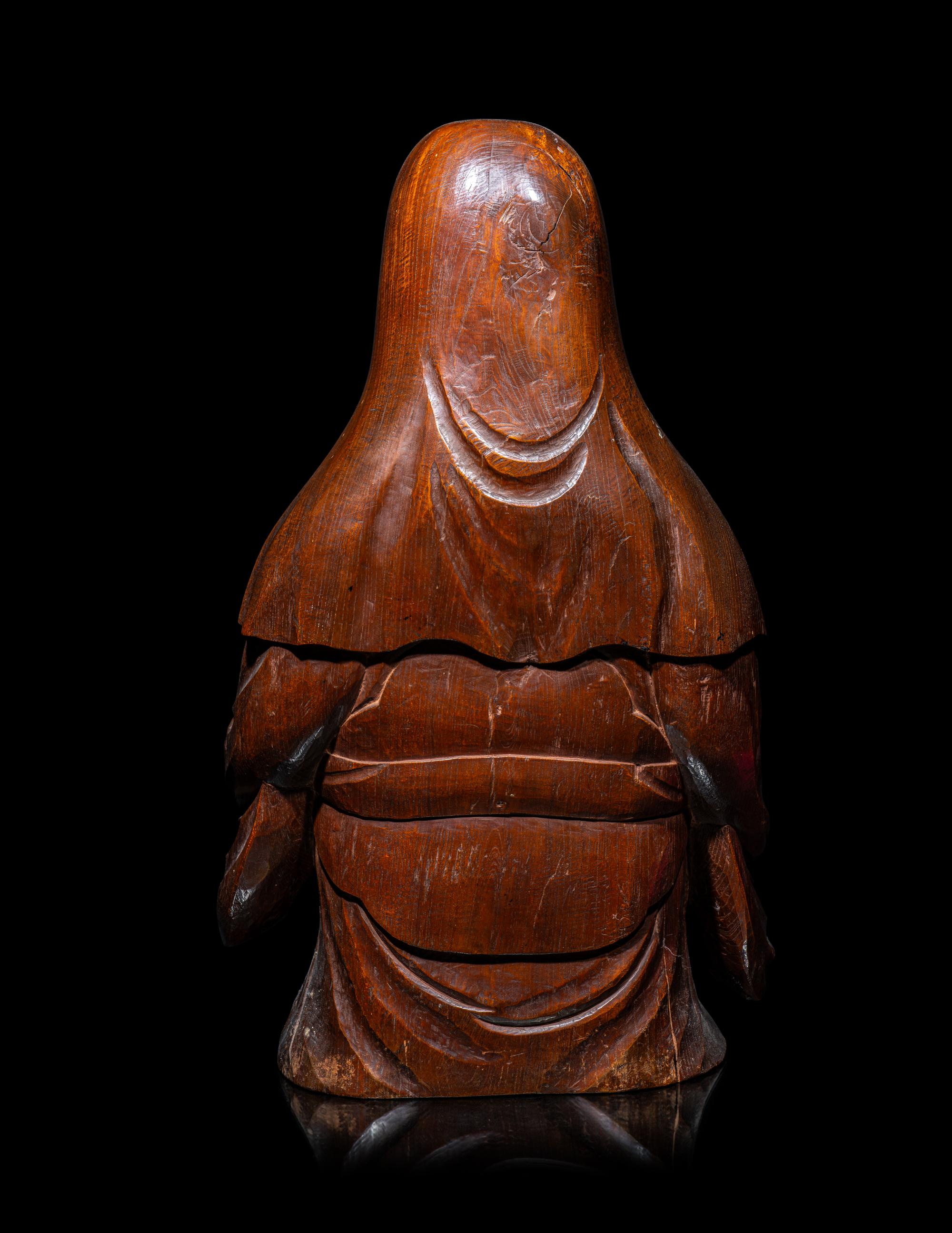 The Nagatani Trademark - A Japanese Carved Hardwood Figure of a Wise Man