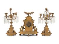 A Napoleon III Style Gilt Bronze and Sèvres Style Porcelain Clock Garniture