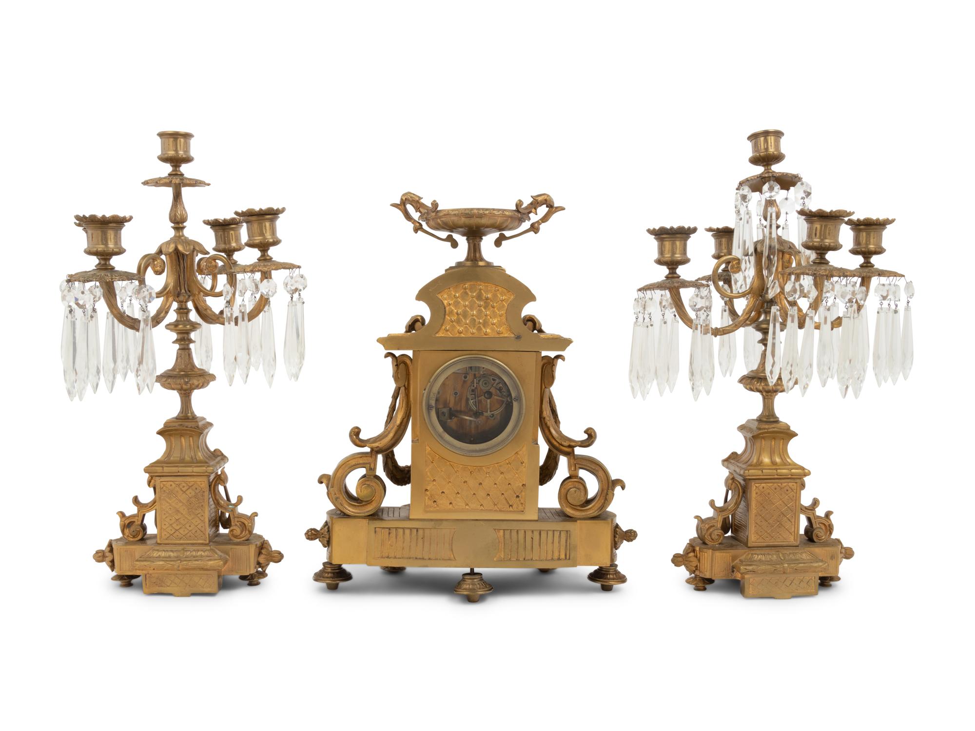 A Napoleon III Style Gilt Bronze and Sèvres Style Porcelain Clock Garniture
