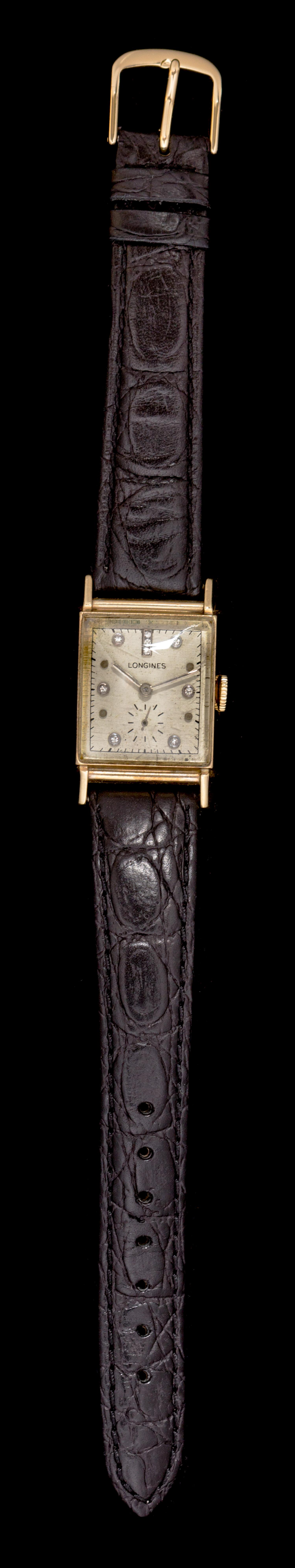 A 14 Karat Yellow Gold Wristwatch, Longines,