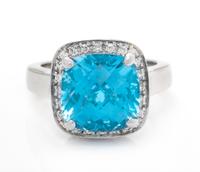 A 14 Karat White Gold, Blue Topaz and Diamond Ring, 6.20 dwts.