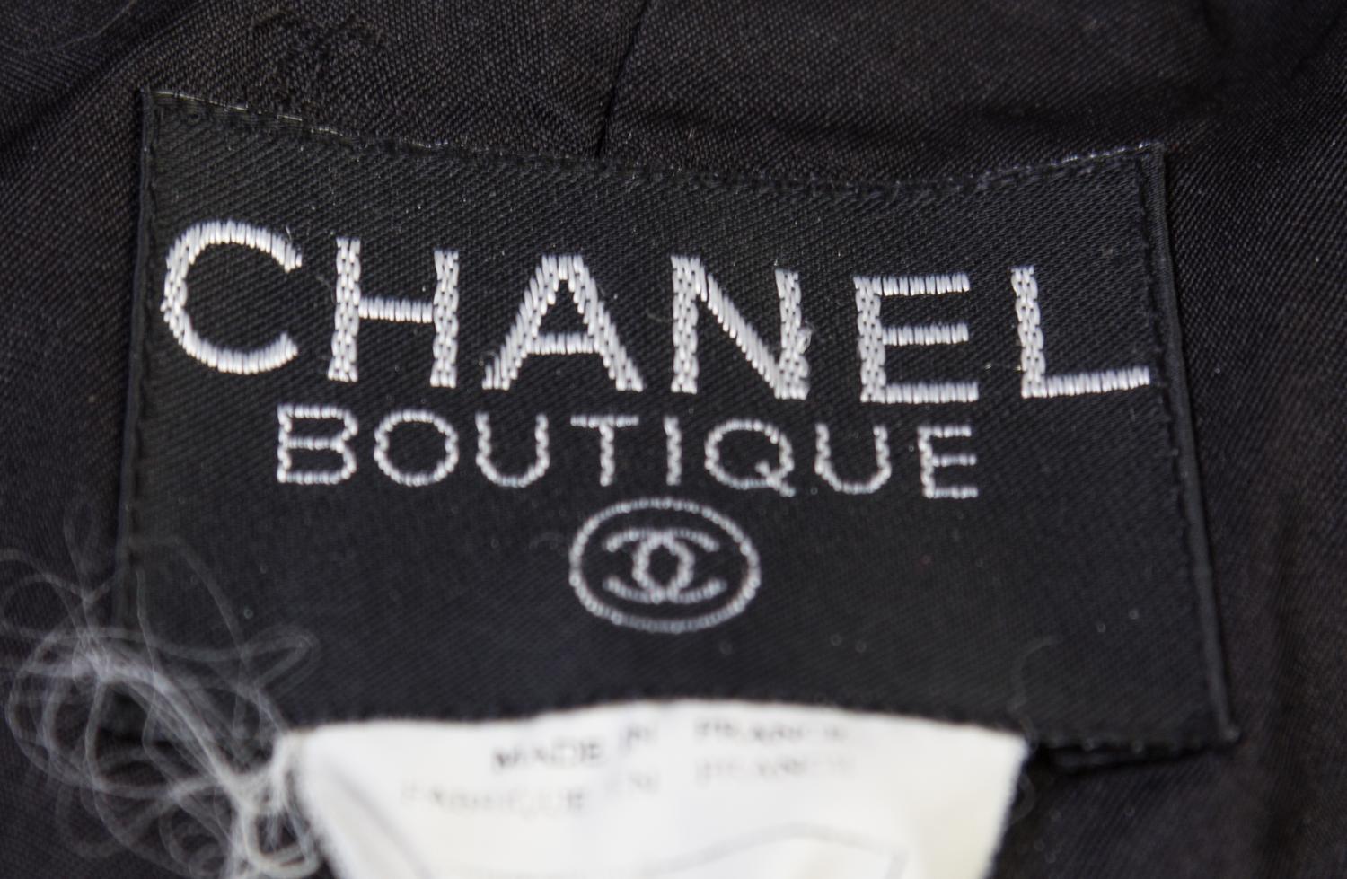 A Chanel Black Wool Suit, Size 38.