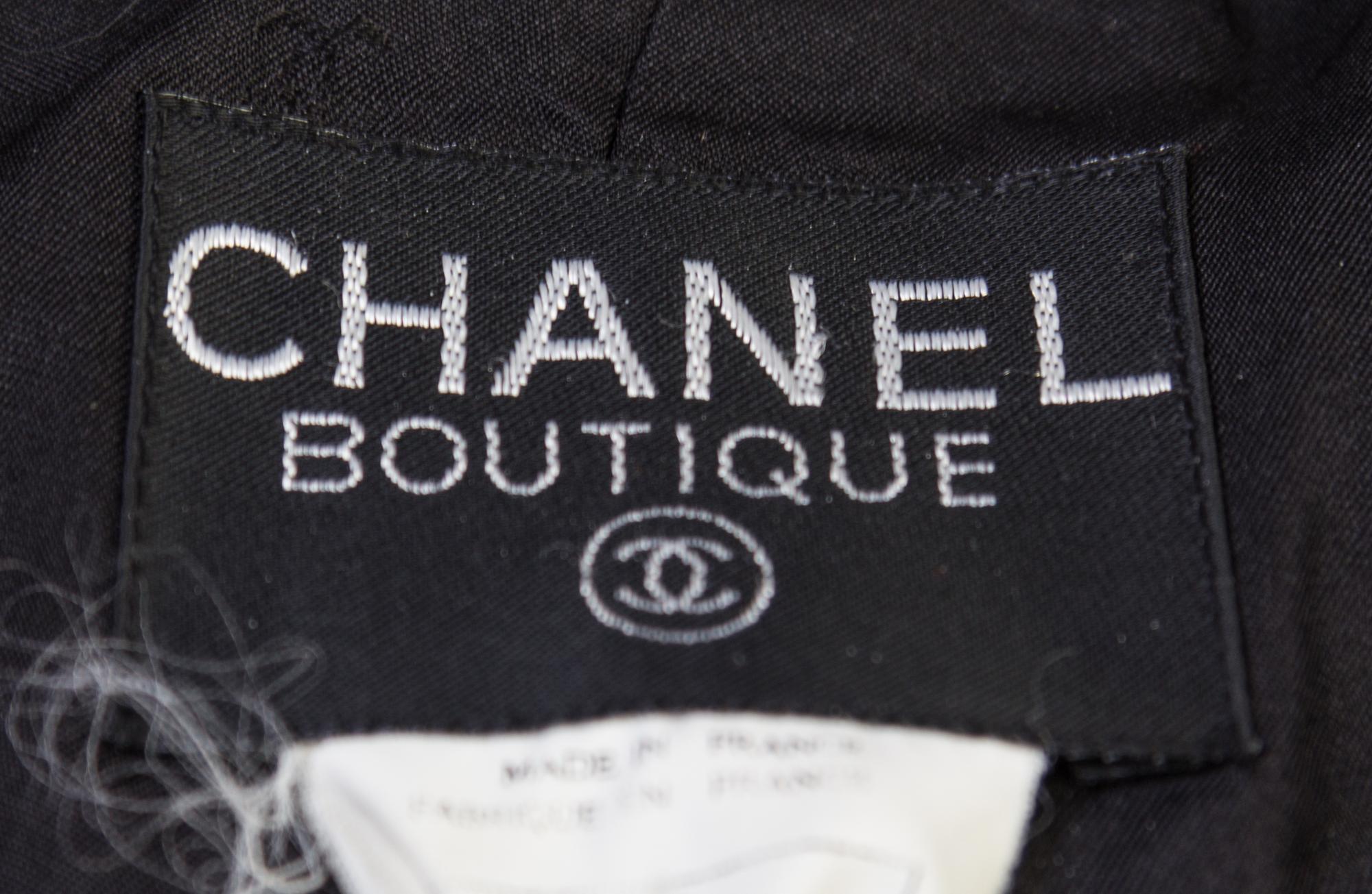 A Chanel Black Wool Suit, Size 38.