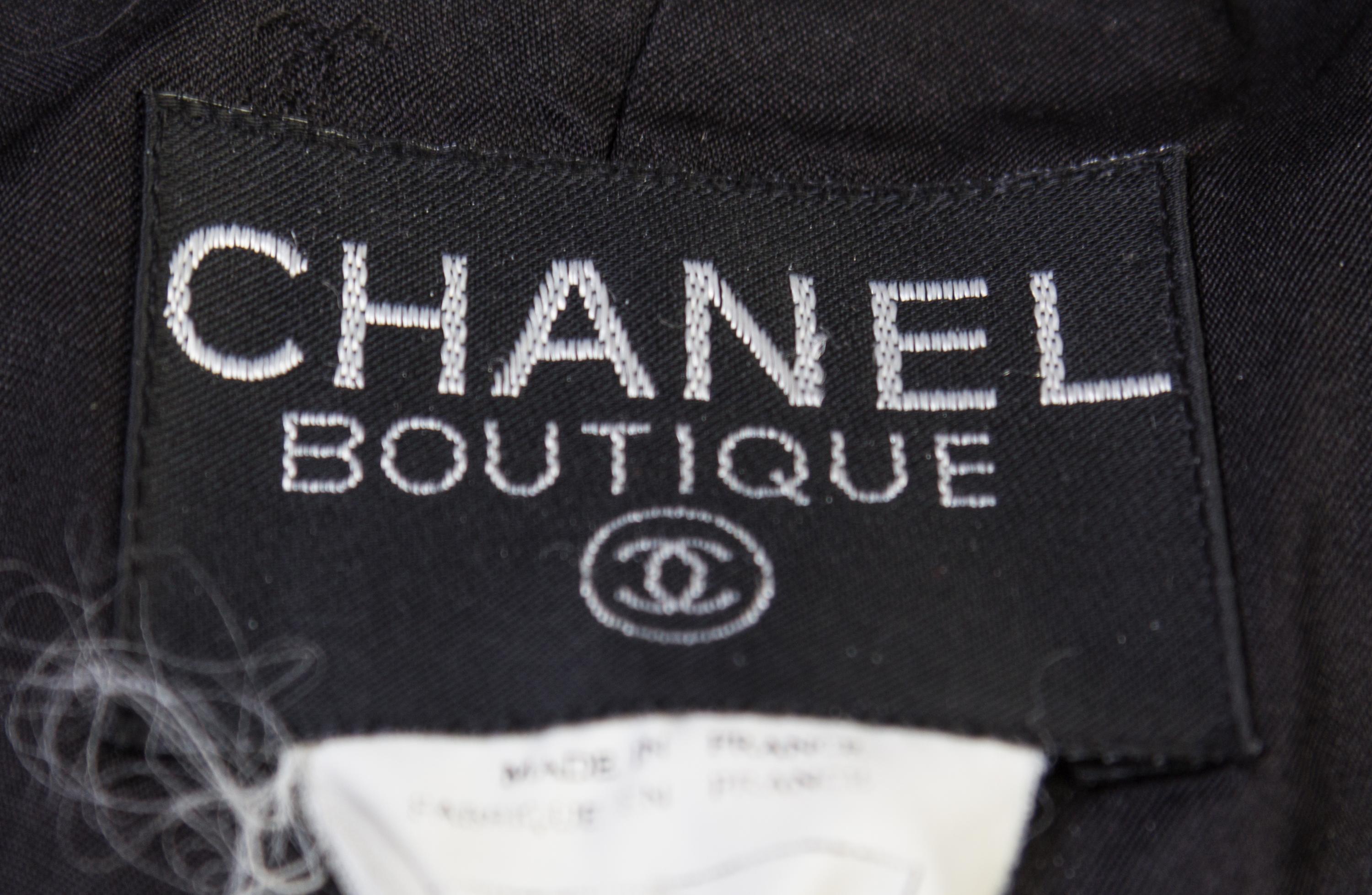 A Chanel Black Wool Suit, Size 38.