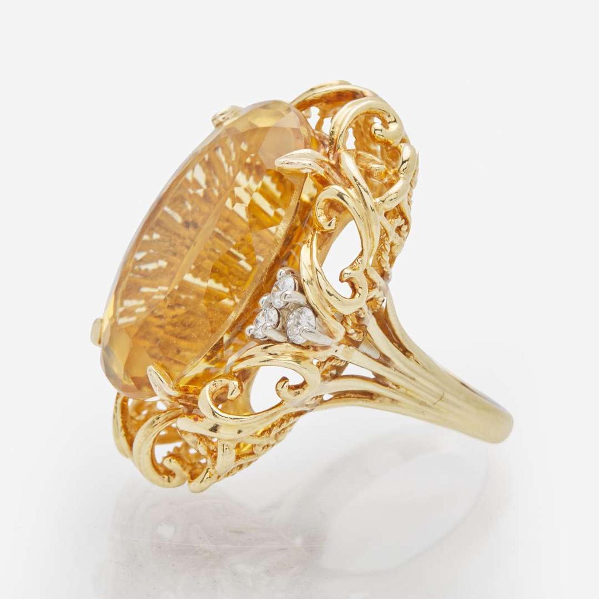 A 14K Yellow Gold, Citrine, and Diamond Ring