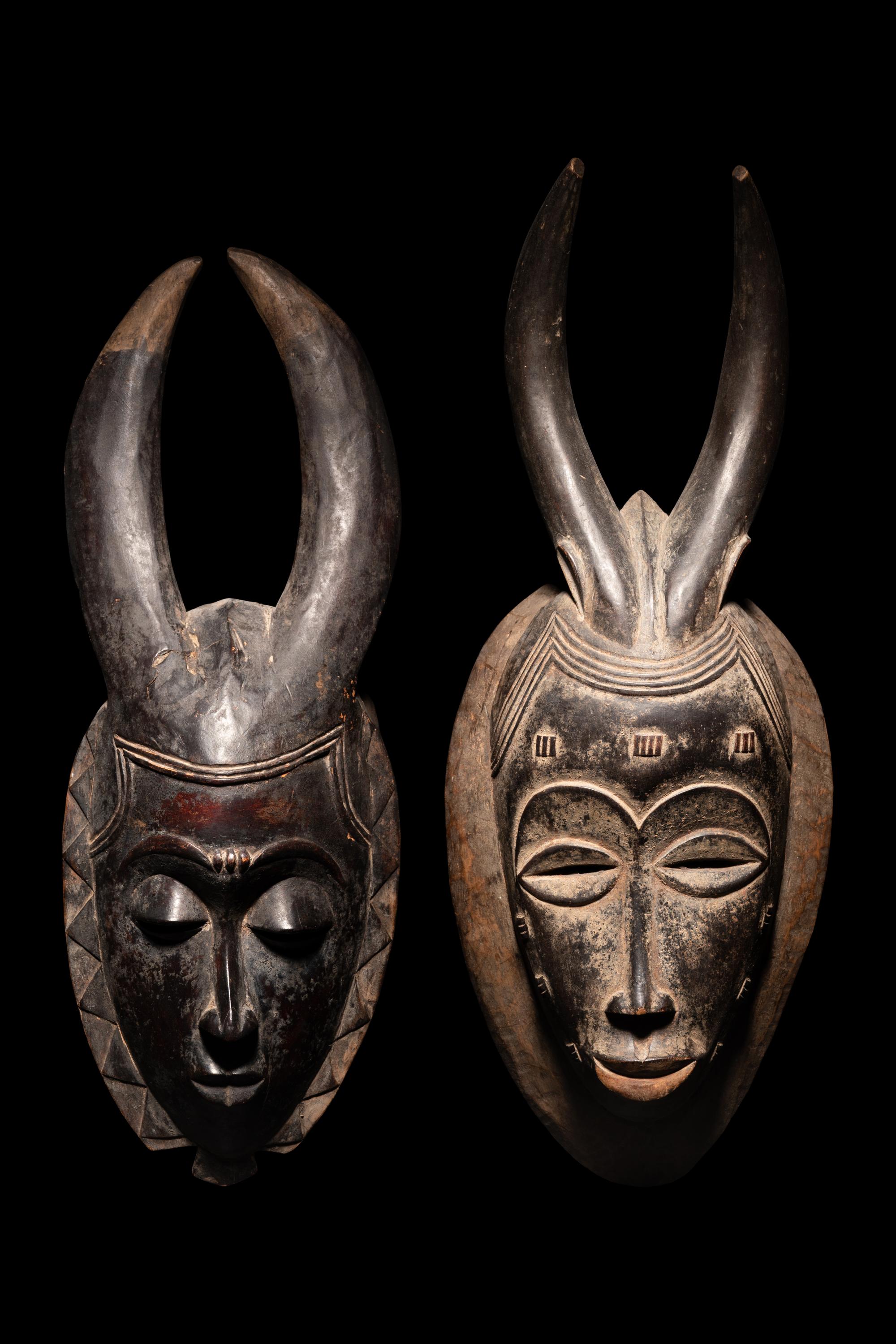 Two Baule Wood Masks