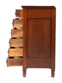 A Federal Carved and Inlaid Cherrywood Chest of Drawers