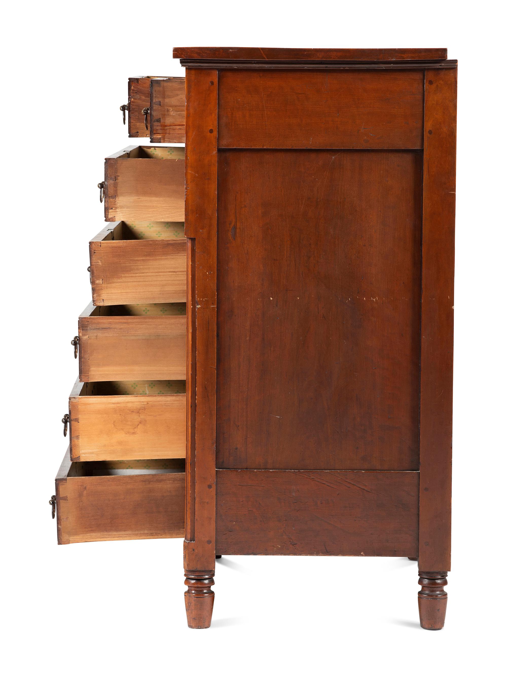 A Federal Carved and Inlaid Cherrywood Chest of Drawers