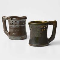 George Ohr (American, 1857-1918) Two Puzzle Mugs in Mirror Brown and Olive Glaze, Biloxi, Mississippi, USA, circa 1898-1910