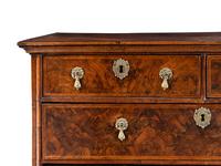 A George II Walnut Chest of Drawers
