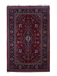 A Tabriz Wool Rug — 20TH CENTURY