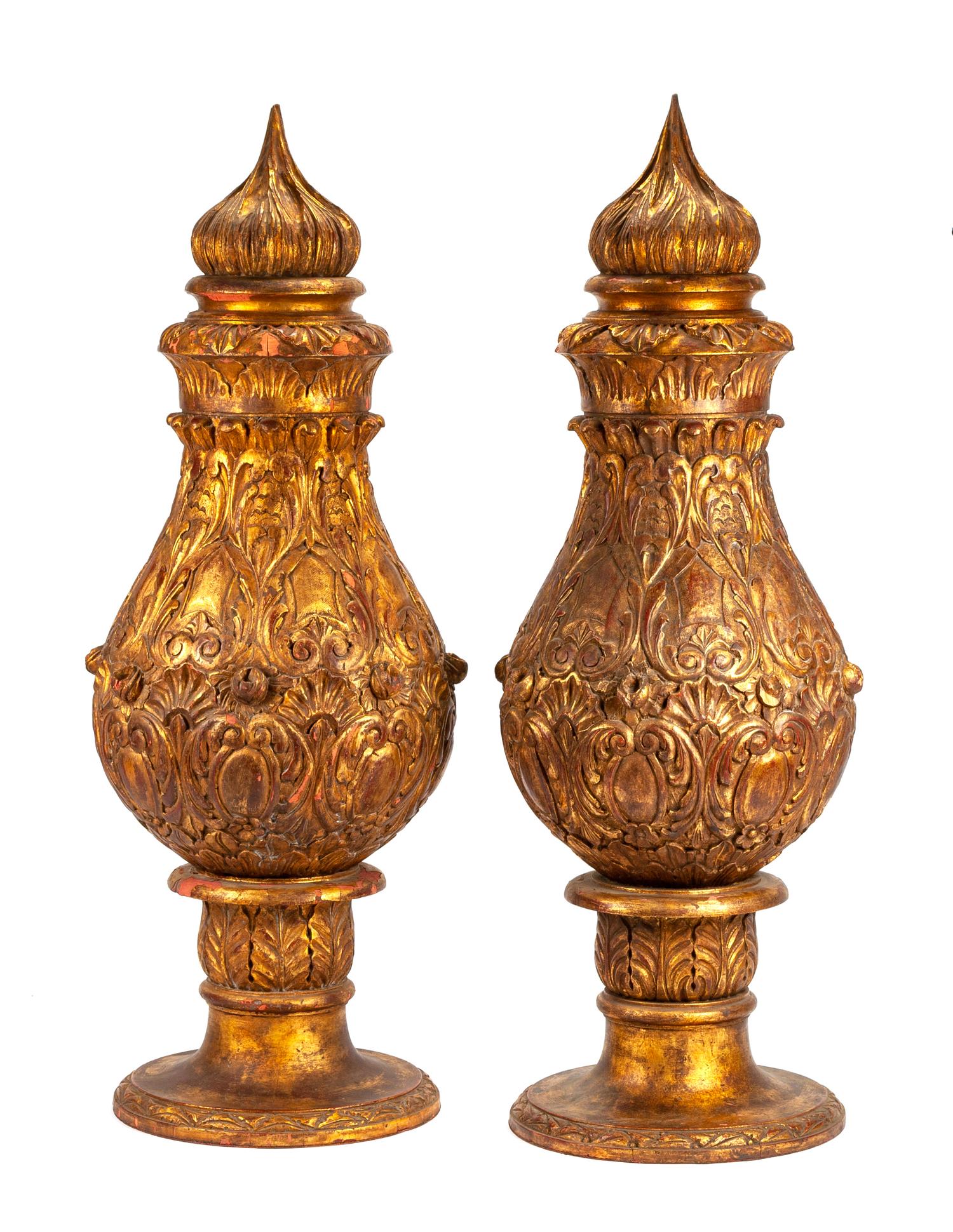 A Pair of Large Gilt Decorated Carved Wood Urns Height 62 inches.