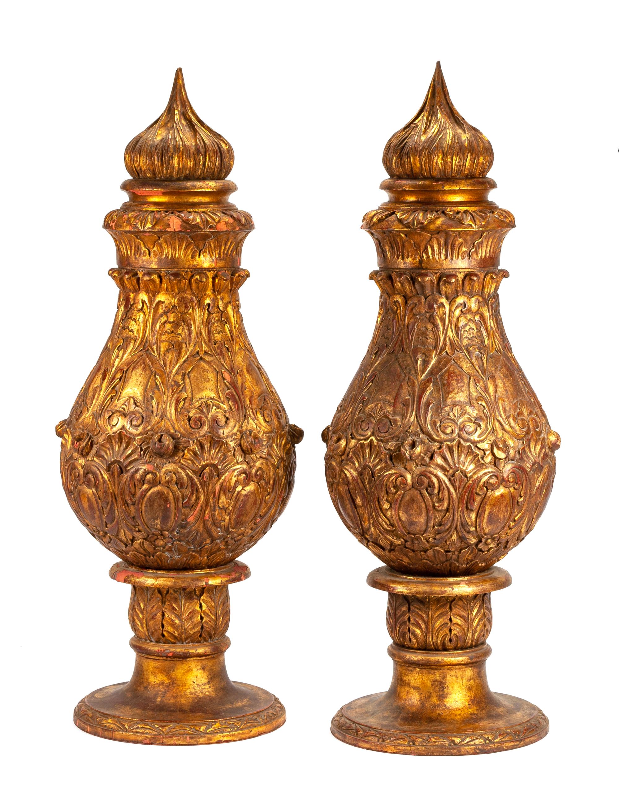 A Pair of Large Gilt Decorated Carved Wood Urns Height 62 inches.