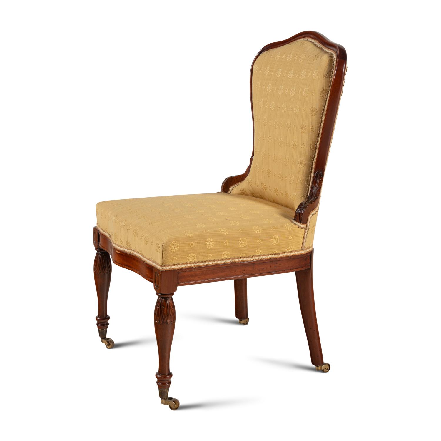An Edwardian Mahogany Slipper Chair