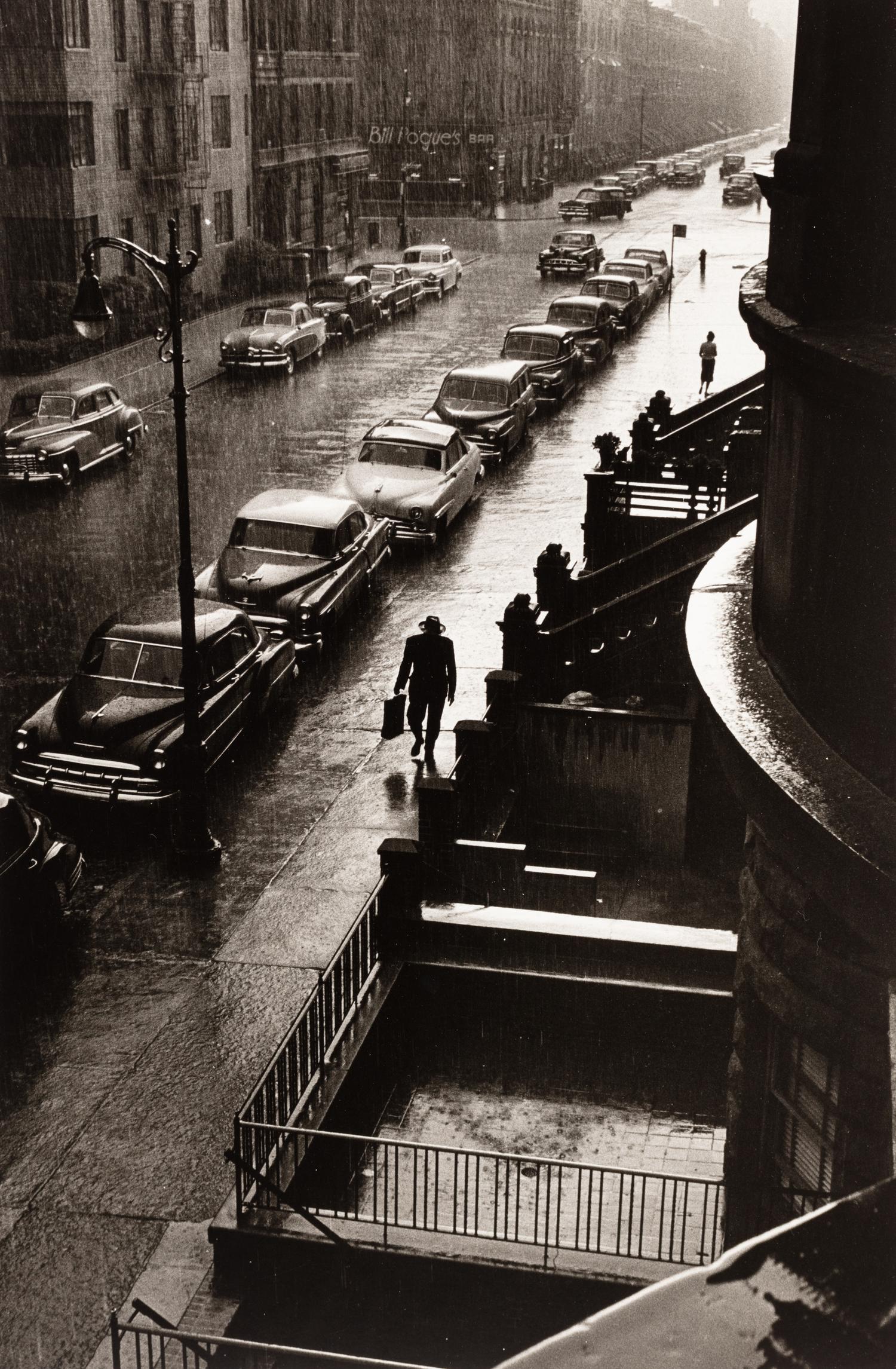 Ruth Orkin (1921-1985) Man in Rain, W. 86th Street, NYC, 1952