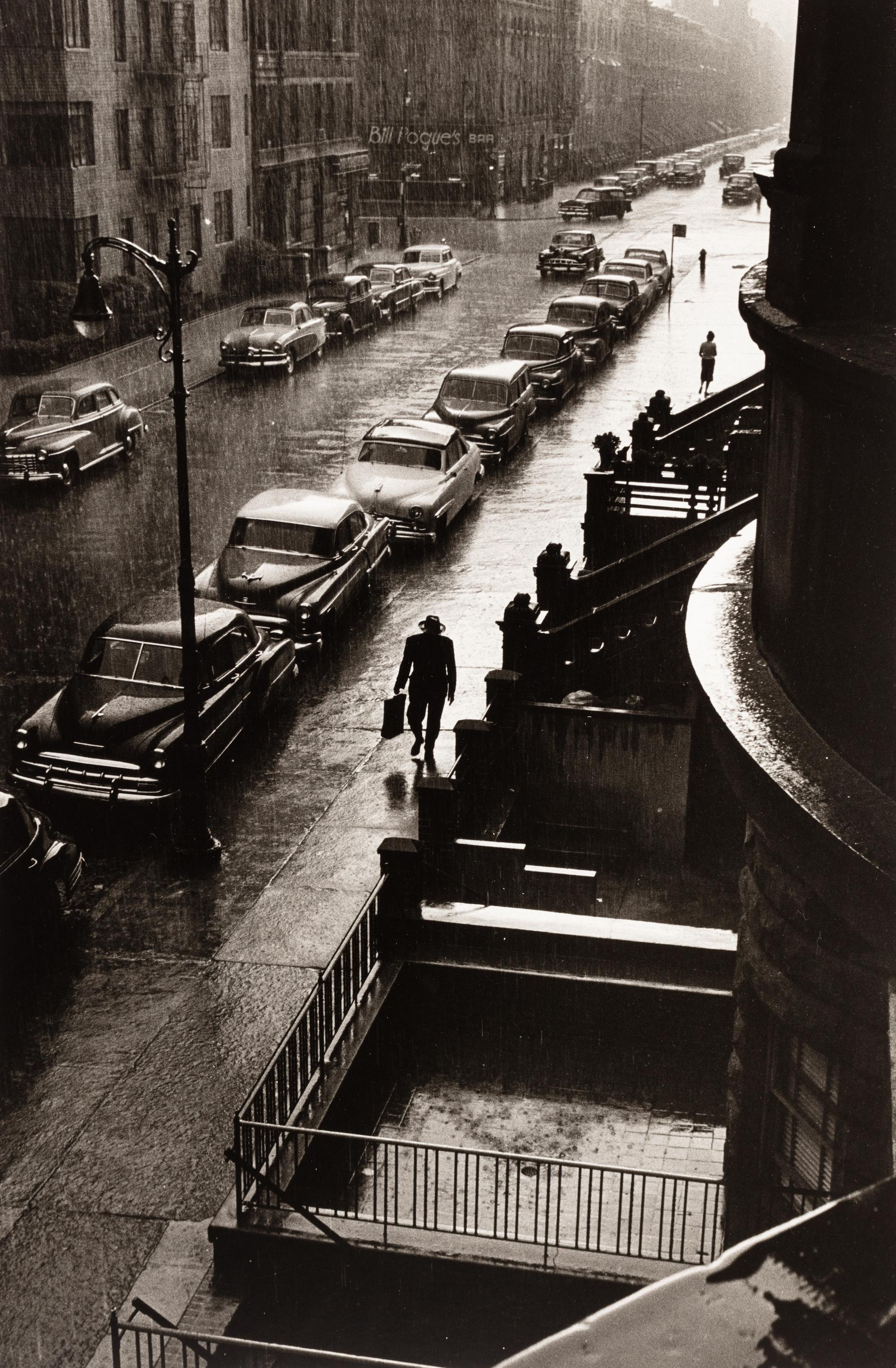 Ruth Orkin (1921-1985) Man in Rain, W. 86th Street, NYC, 1952