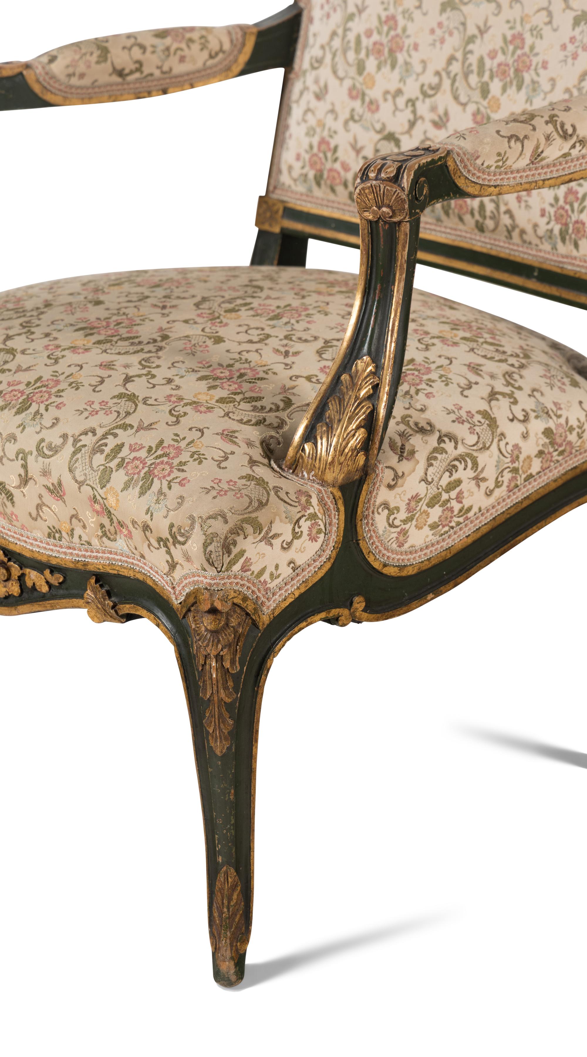 A Pair of Italian Rococo Style Painted and Parcel Gilt Fauteuils