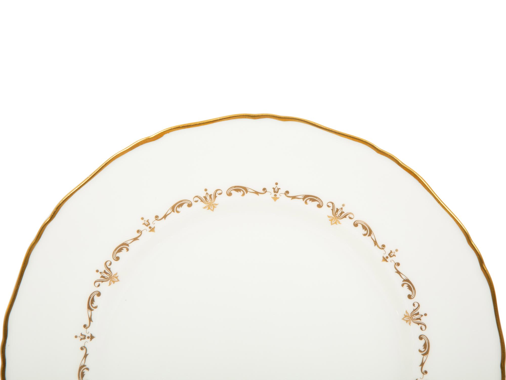 A Royal Worcester Gold Chantilly Porcelain Dinner Service