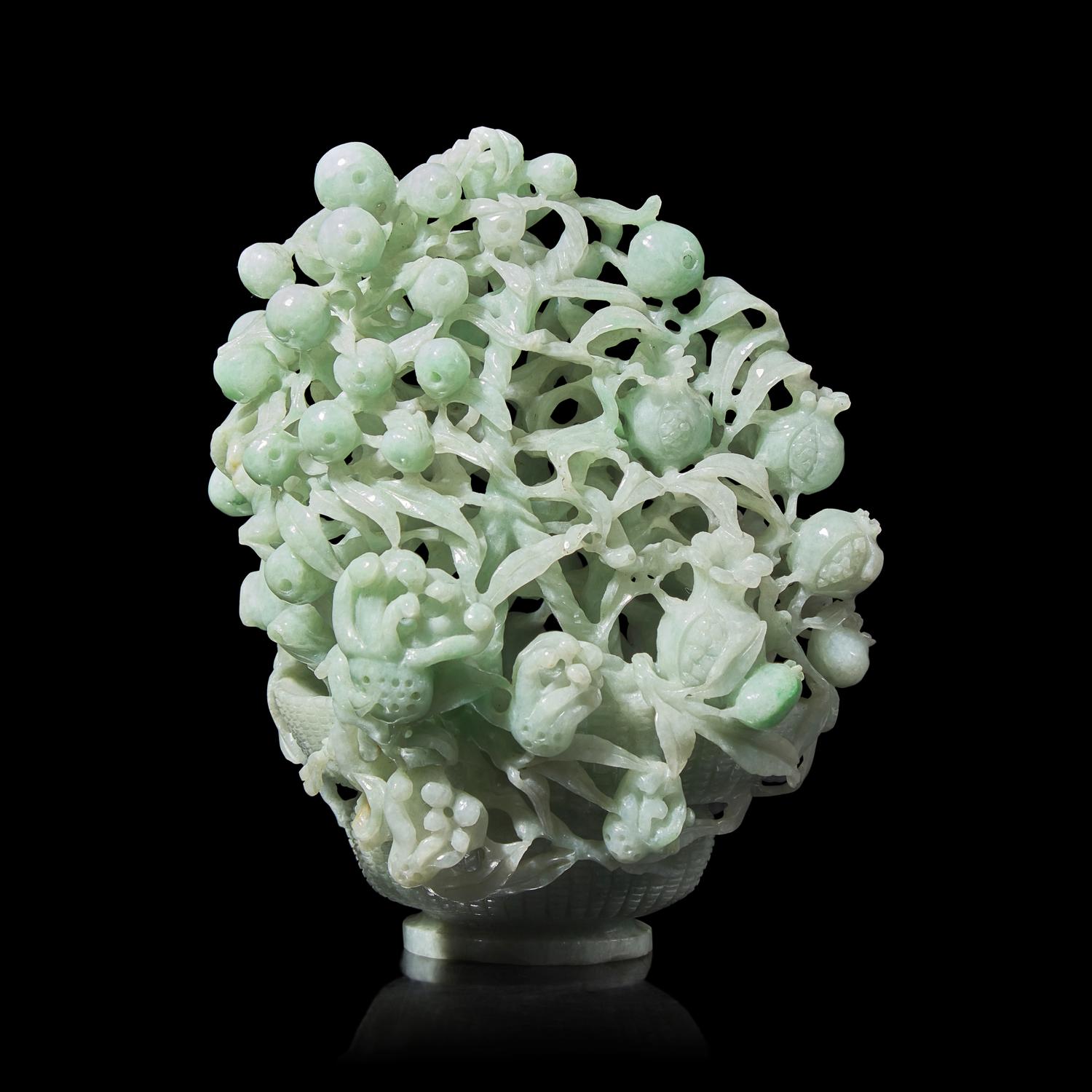 A Chinese Reticulated Jadeite "Sanduo" in Basket Group, 20th Century 近代 翡翠鏤雕三多擺件