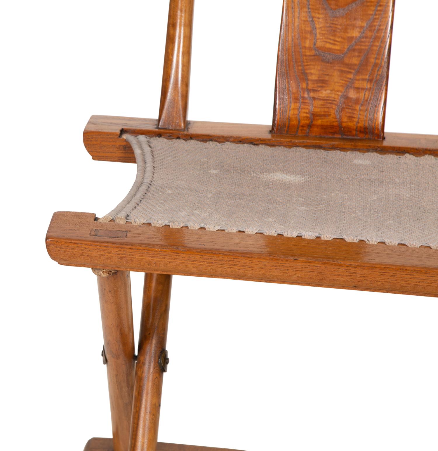 A Chinese Hardwood Campaign Chair