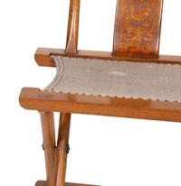 A Chinese Hardwood Campaign Chair