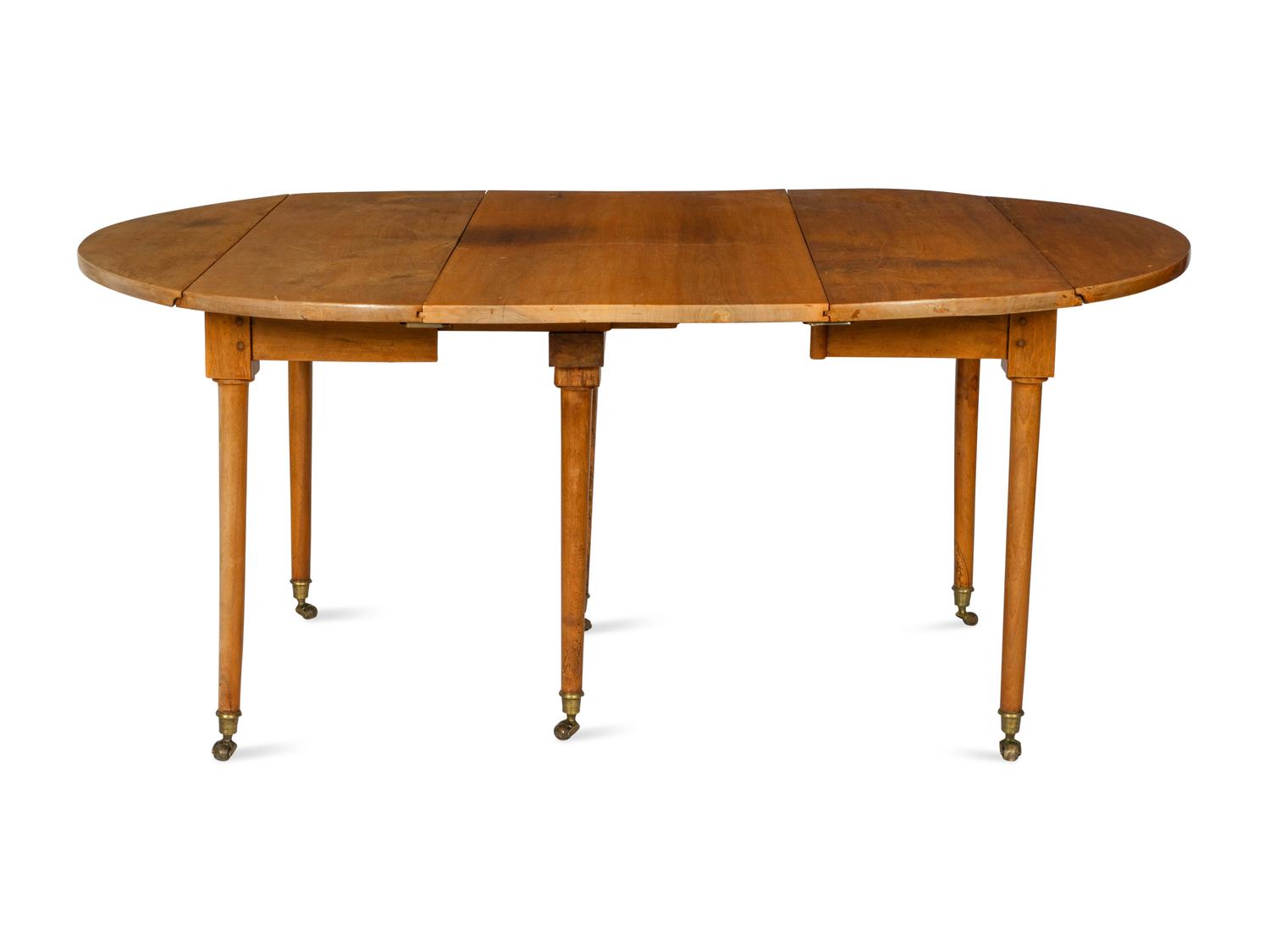 A Directoire Walnut Dining Table
