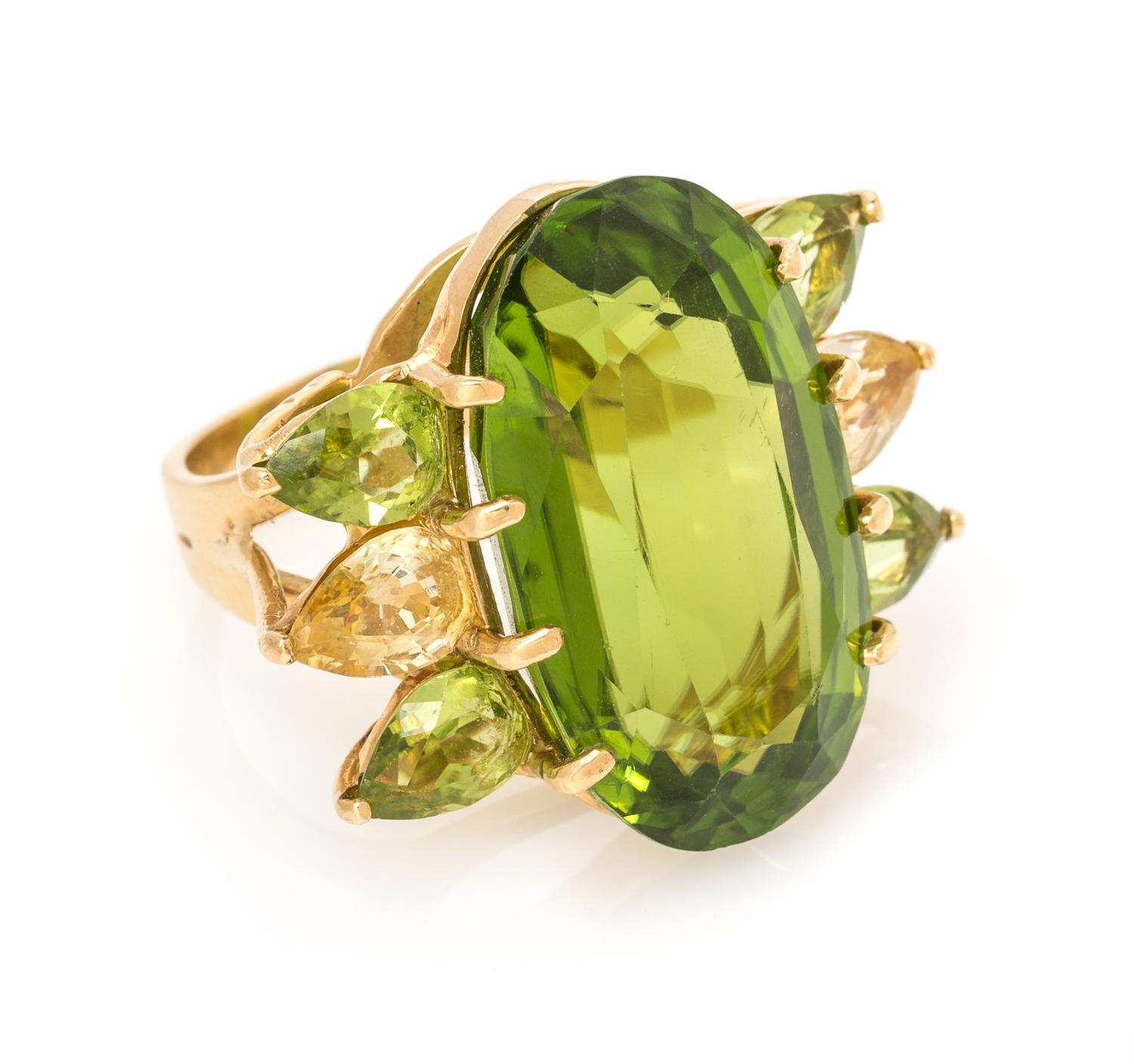 An 18 Karat Yellow Gold, Peridot and Lemon Quartz Ring, 10.60 dwts.